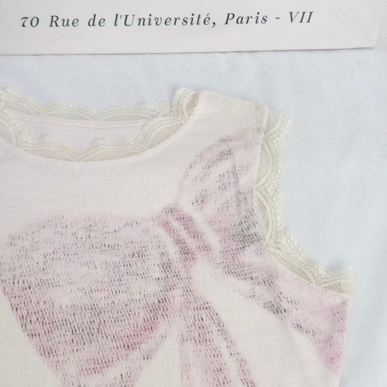 Belted floral print sleeveless top