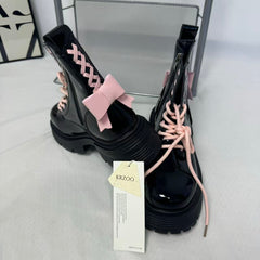 Pink bow leather boots