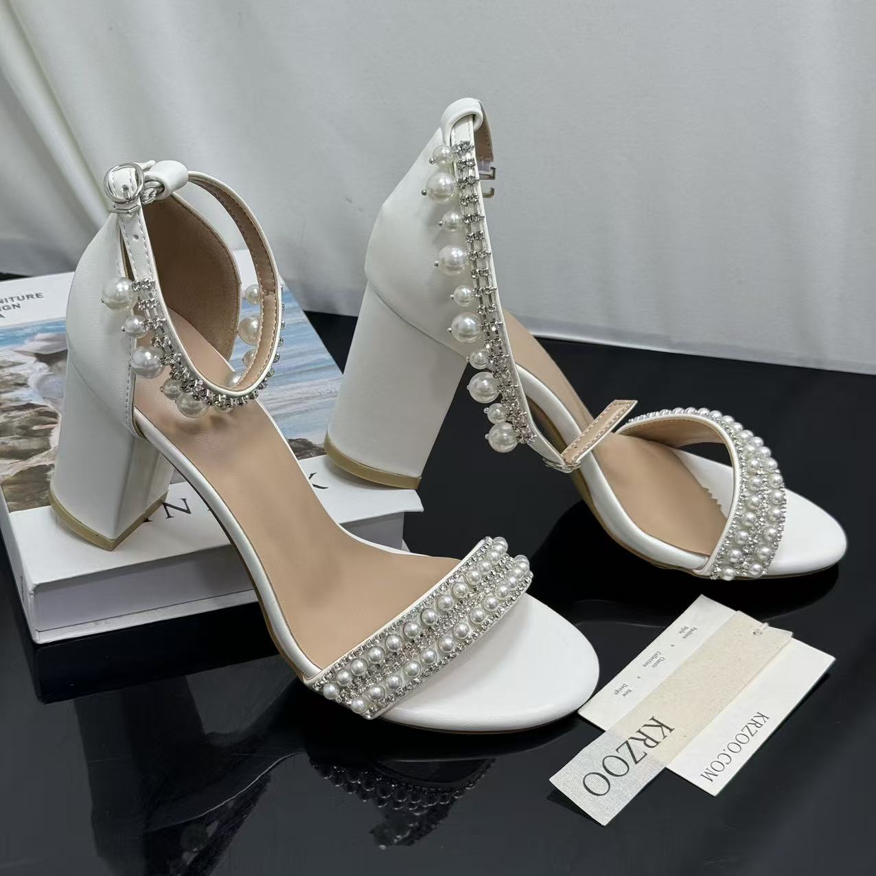 White ankle strap pearl necklace sandals