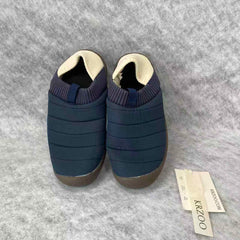 Wearing two pairs of short woolen shoes