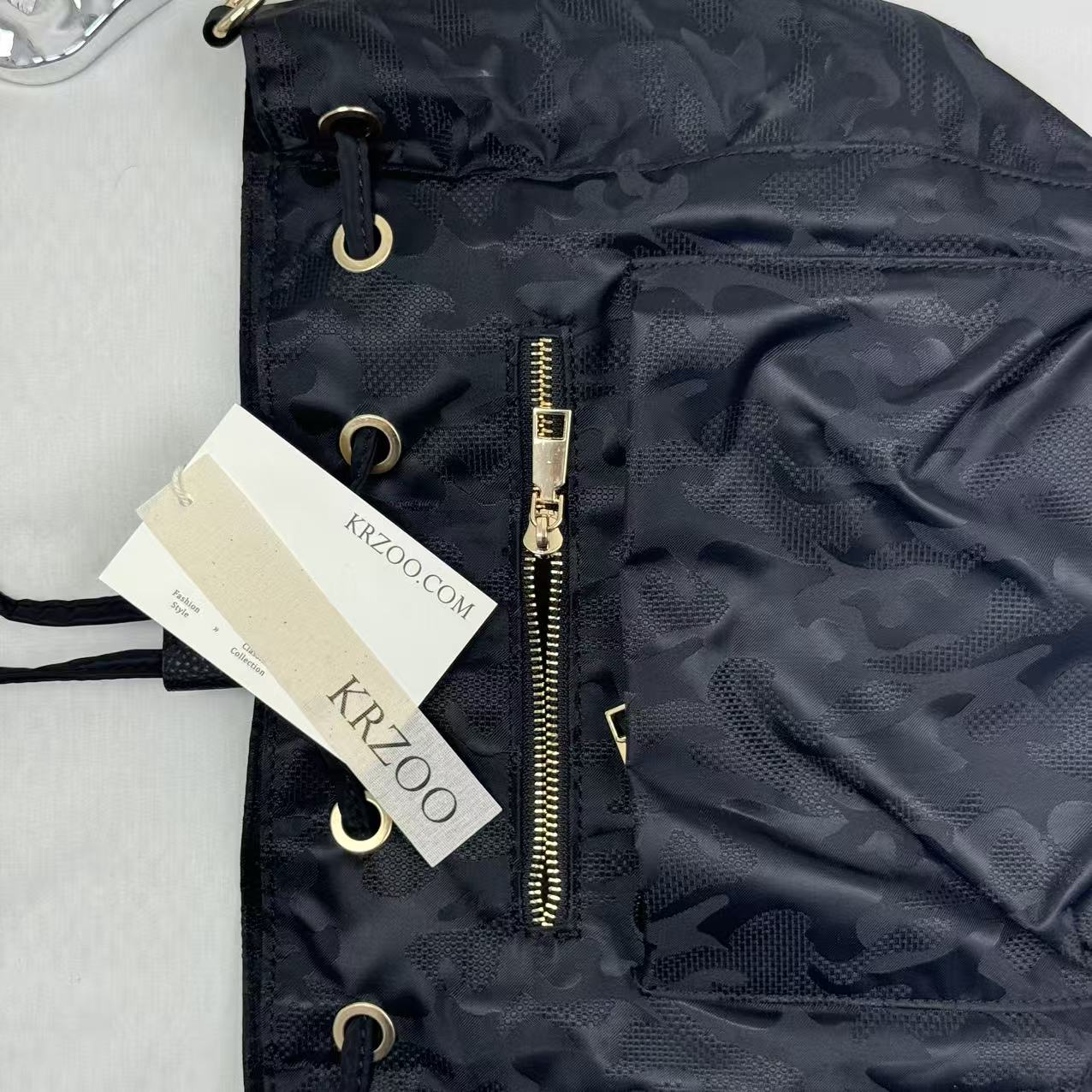 Zippered drawstring crossbody bag
