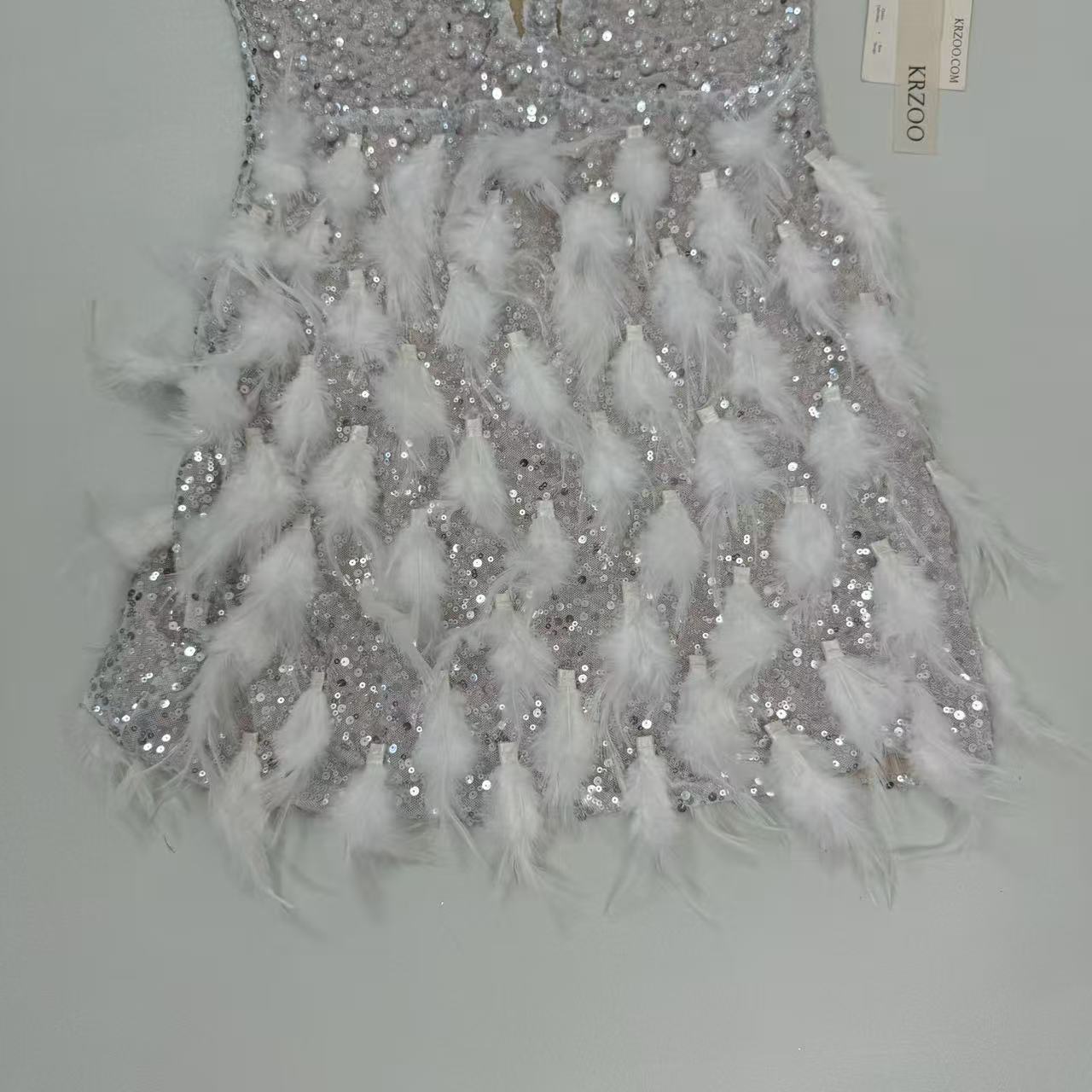 Backless pearl rhinestone feather dress