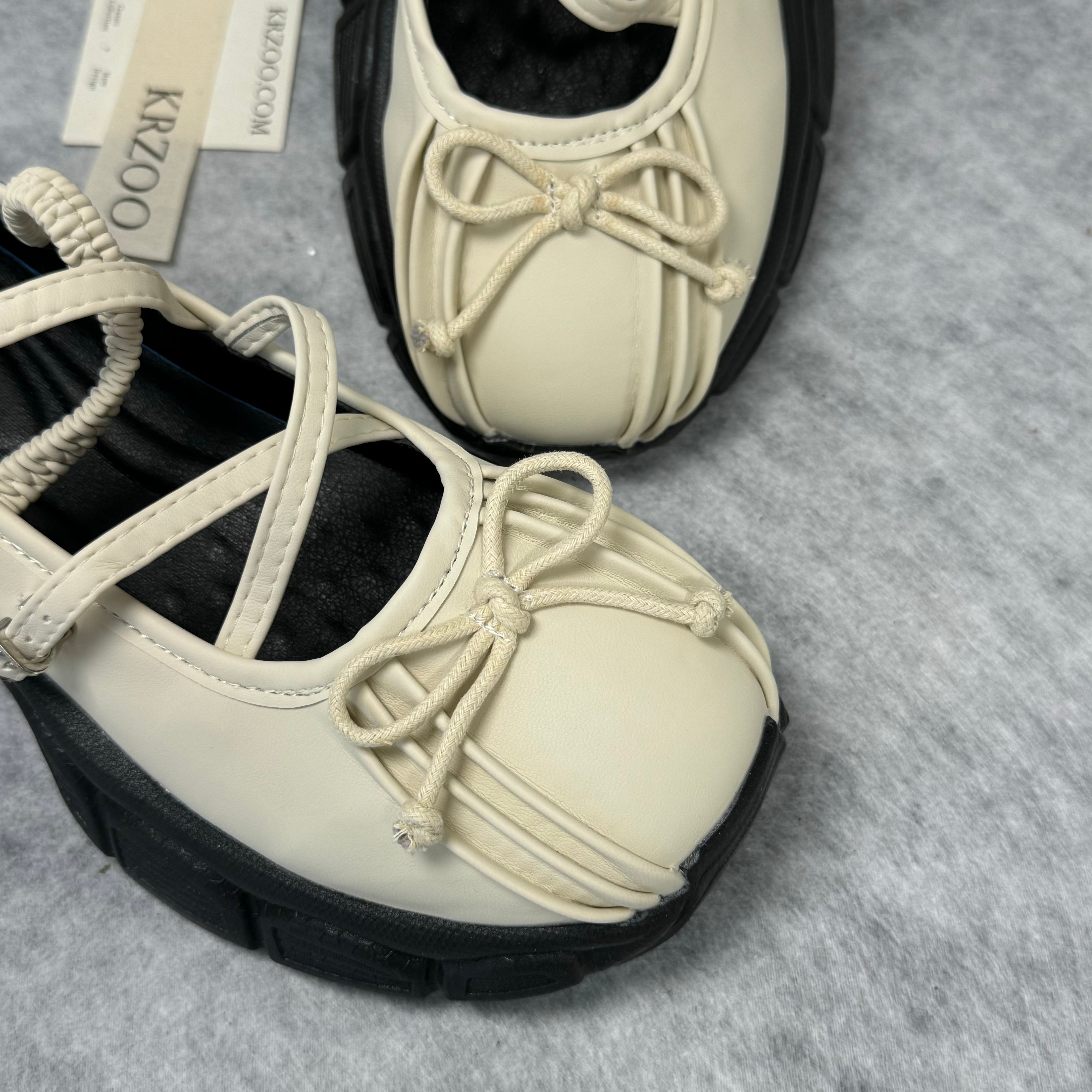 Belted platform ballet shoes with bow ties