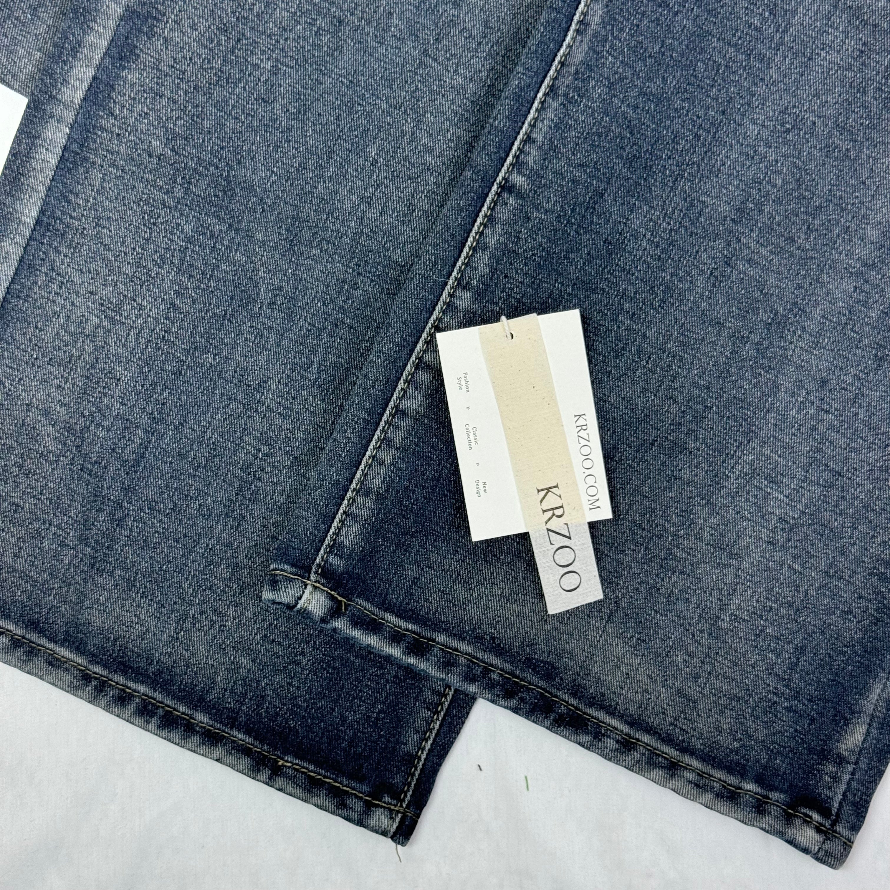 Washed and distressed denim pants