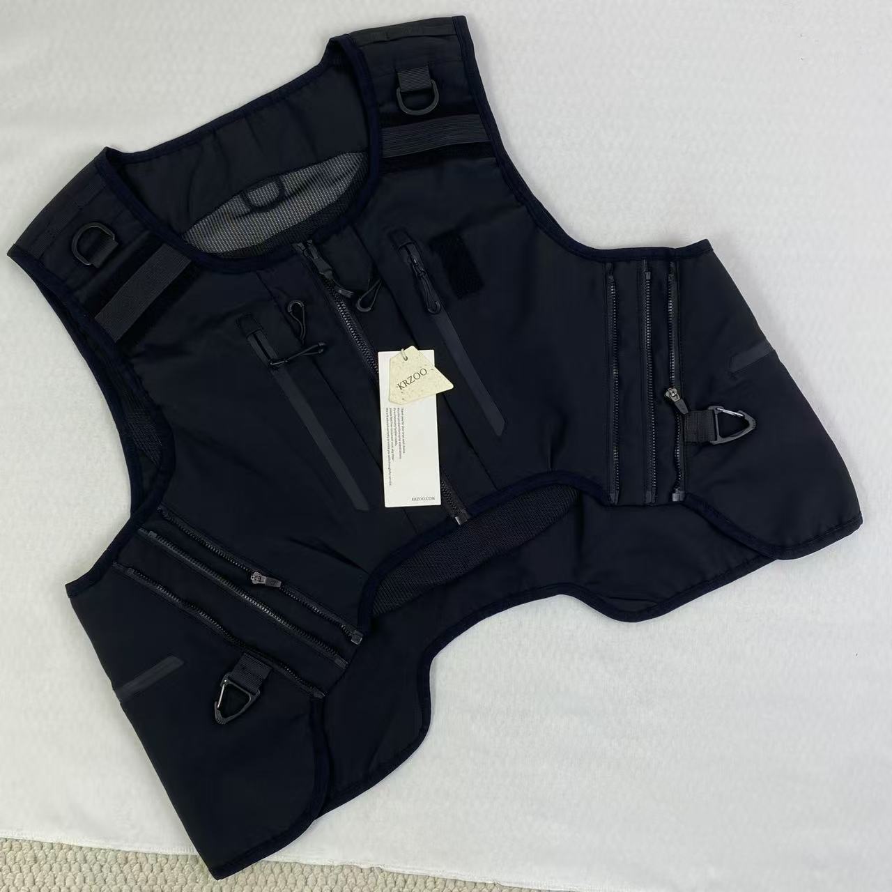 Dark black leather work jacket with no sleeves
