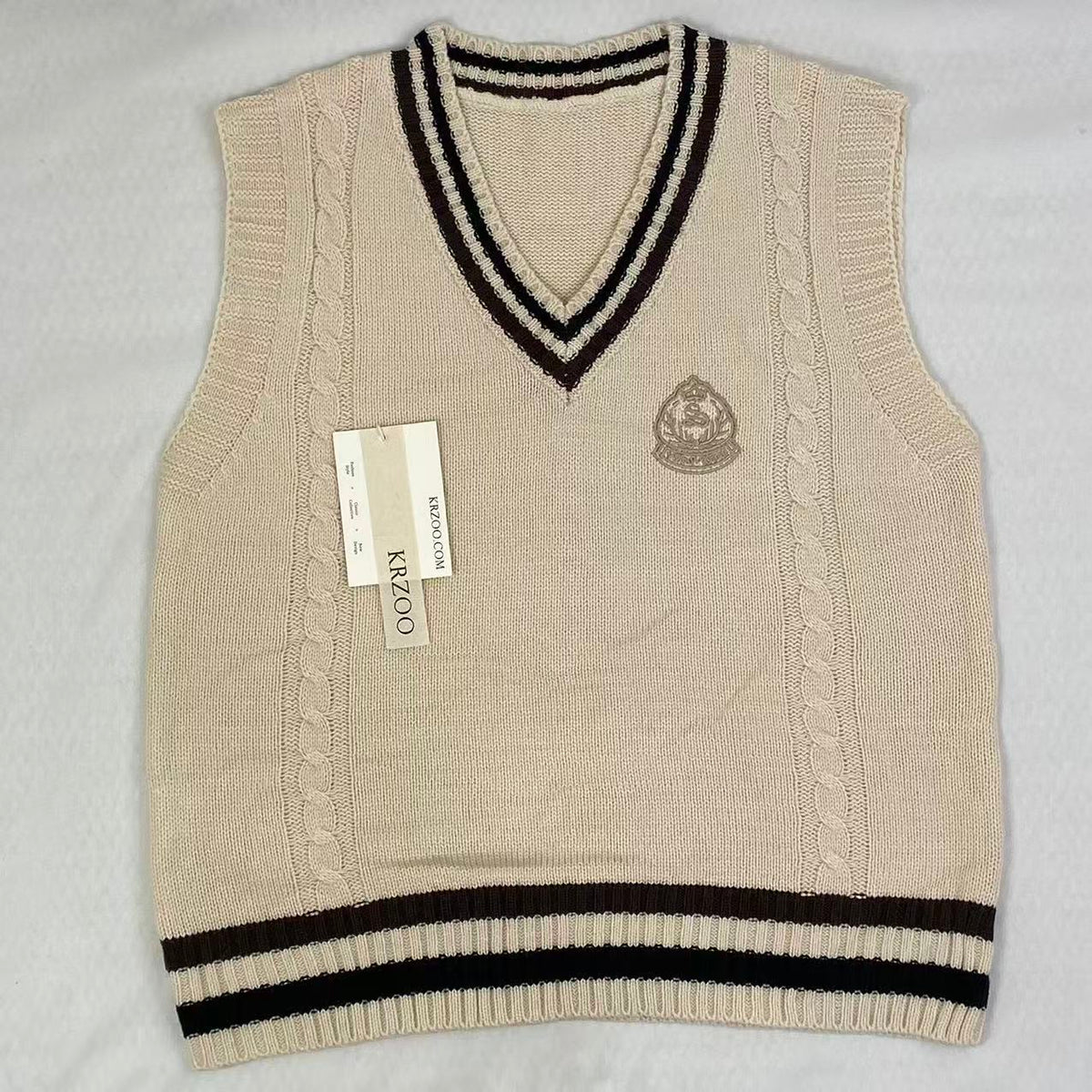 College-style knitted pullover vest