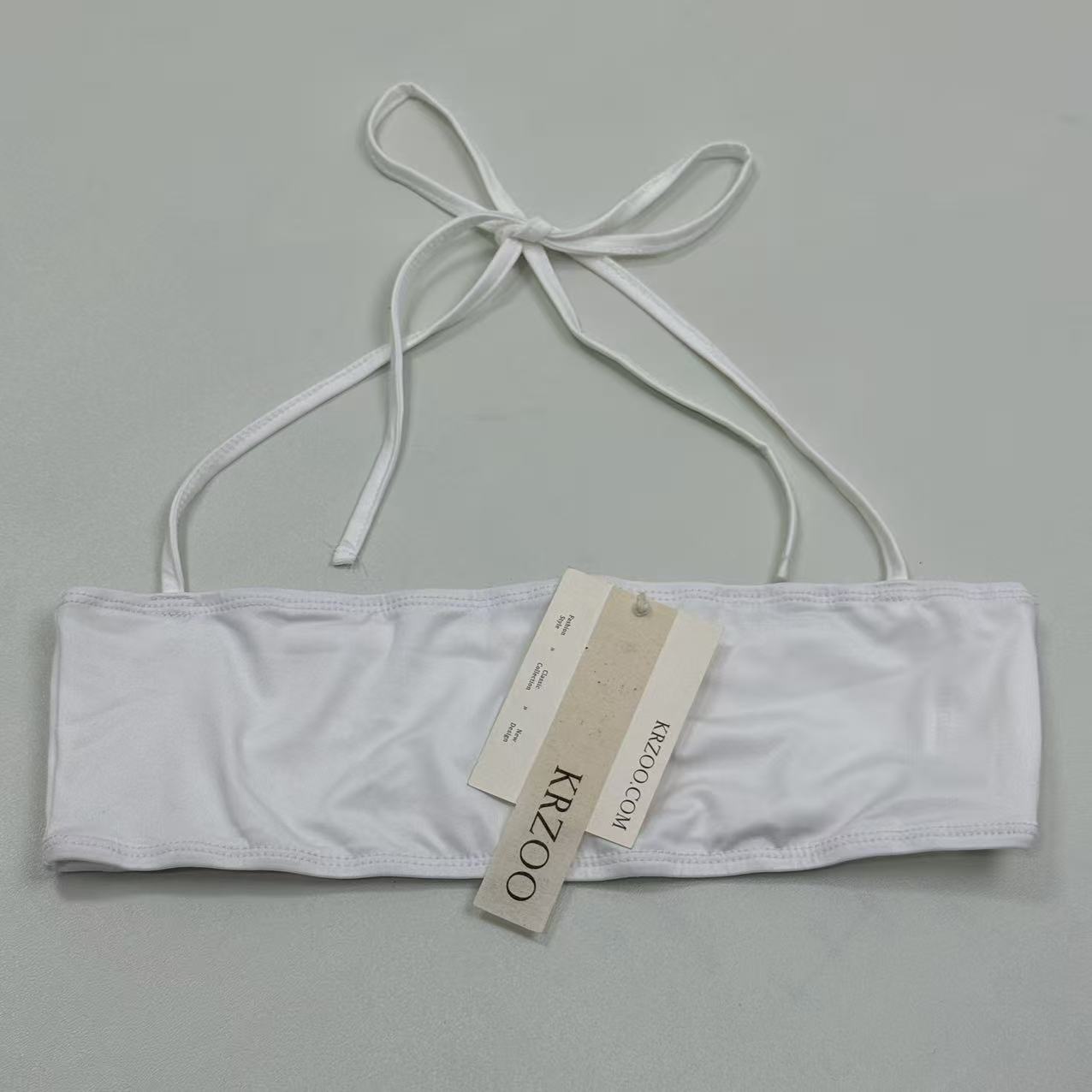Cotton one-piece neckless plunging top