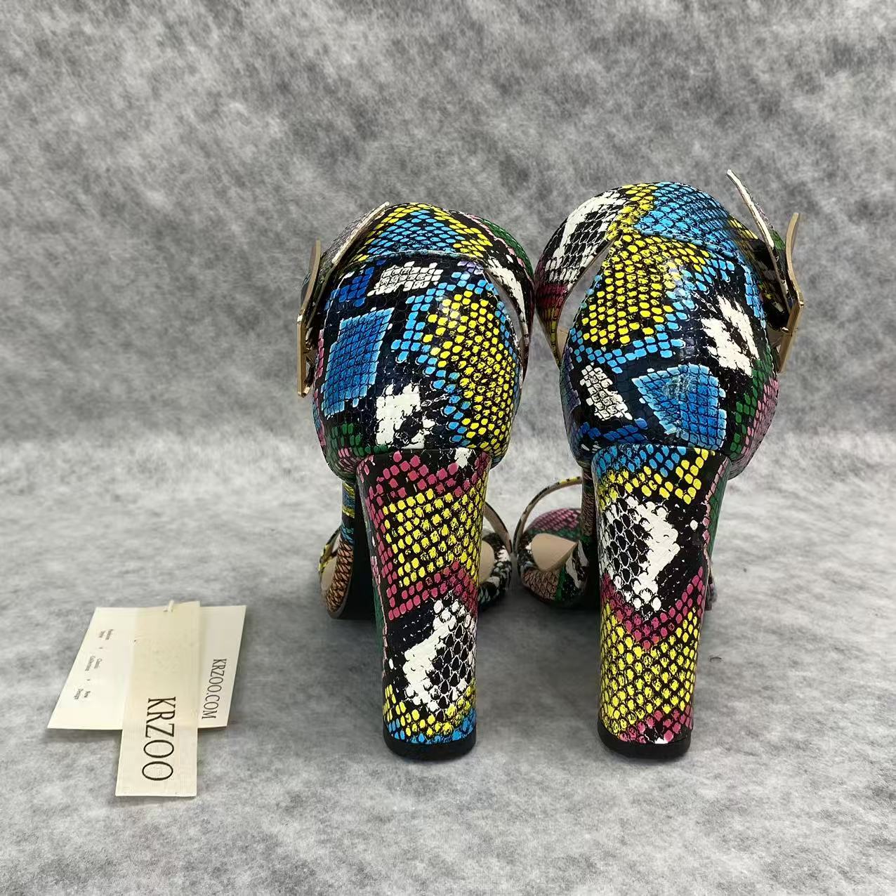 Snake-patterned chunky heels
