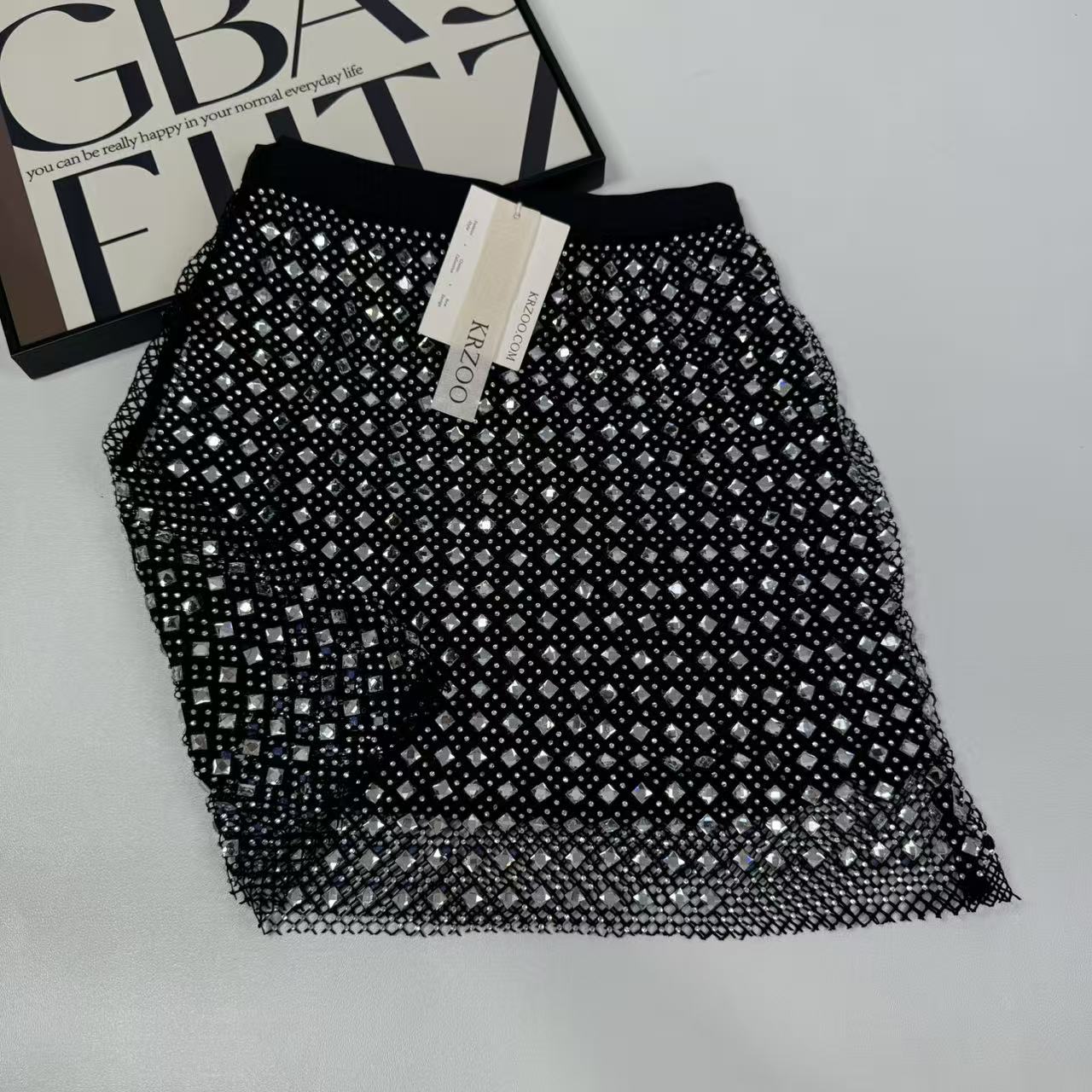 Beaded and rhinestone-studded half-length skirt
