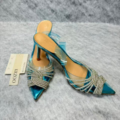 Pointed-toe transparent crystal high heels