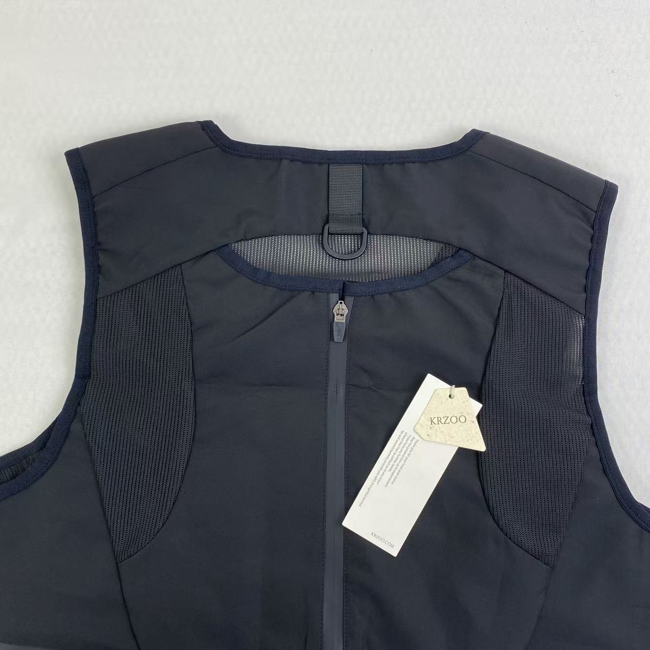 Dark black leather work jacket with no sleeves