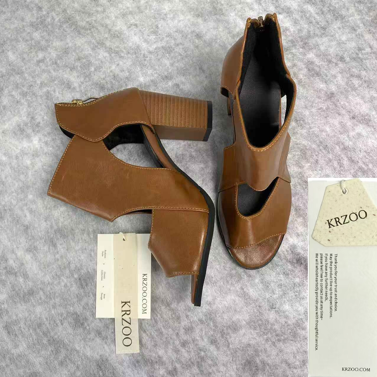 Fish-shaped hollowed-out thick heel high heels