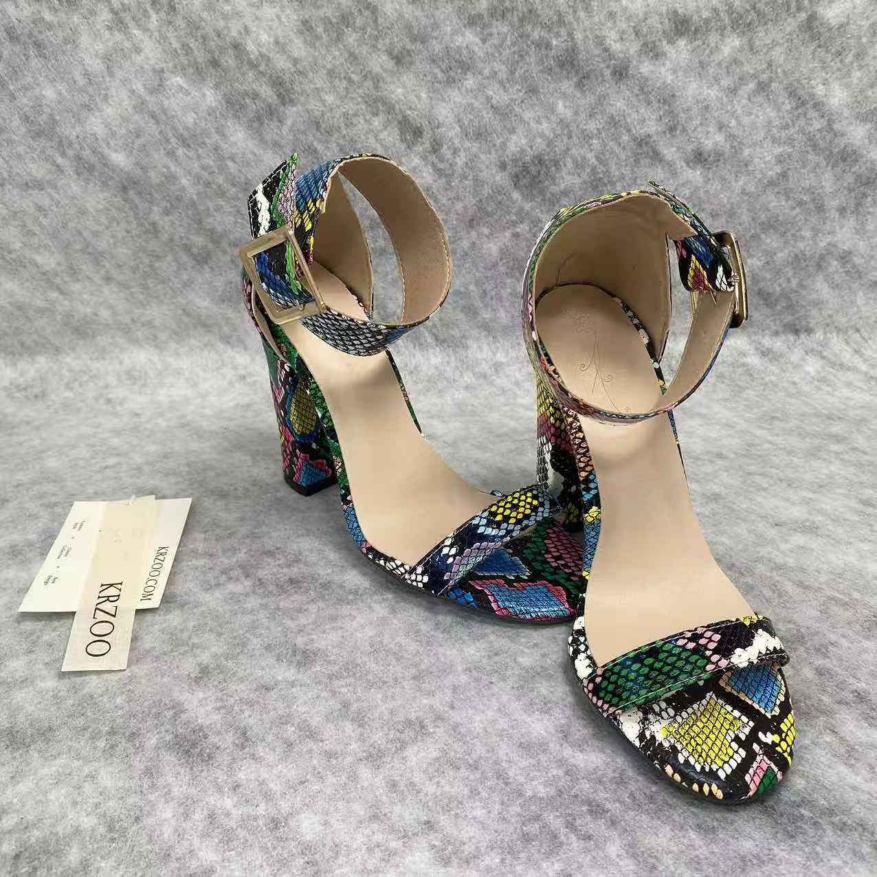 Snake-patterned chunky heels