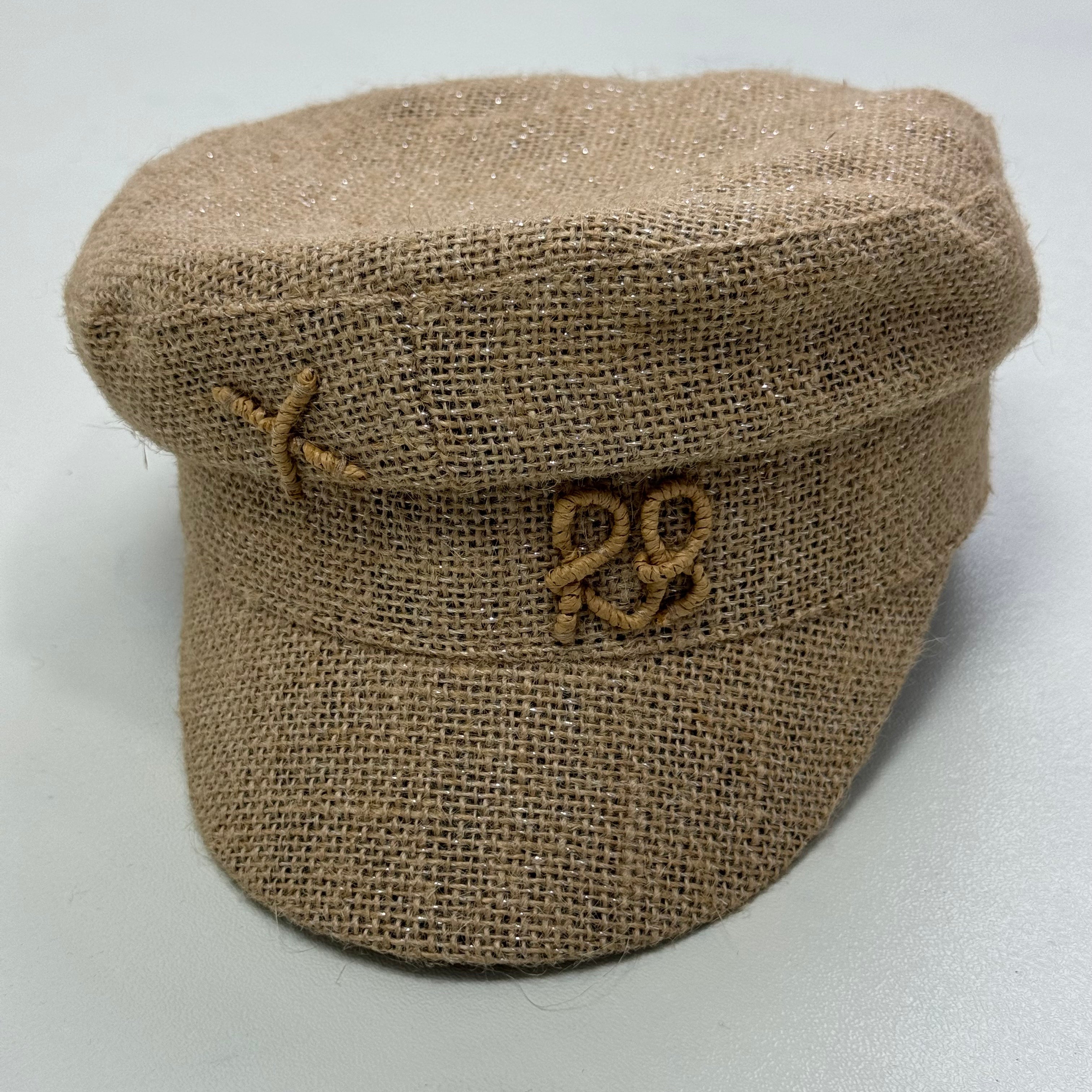 Woven straw cap with a flat top