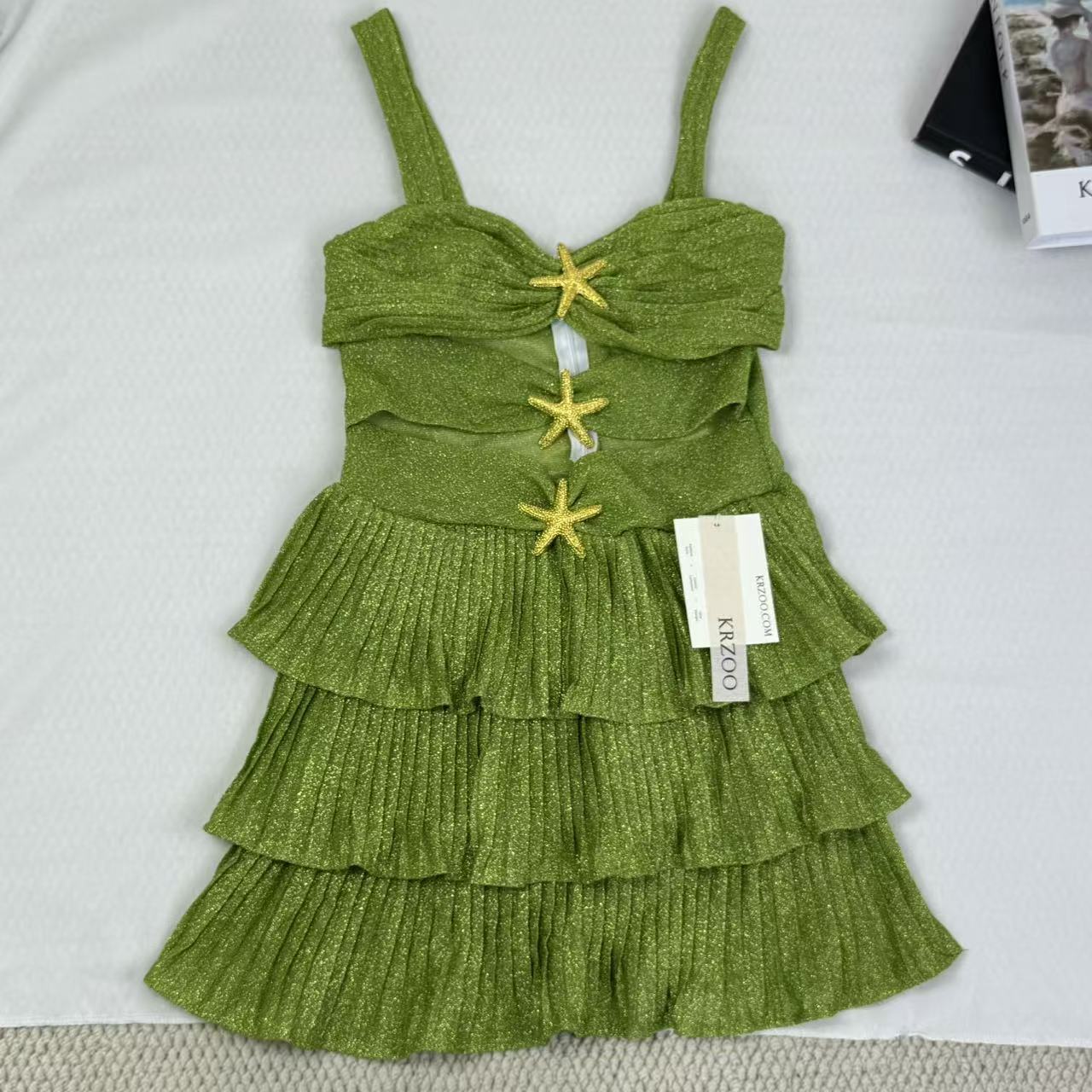 V-neck halter dress with sequins on the skirt