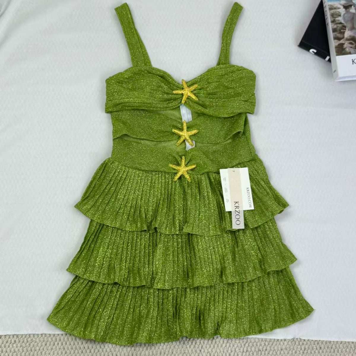 V-neck halter dress with sequins on the skirt