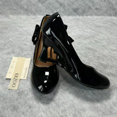 Pegged bow leather shoes