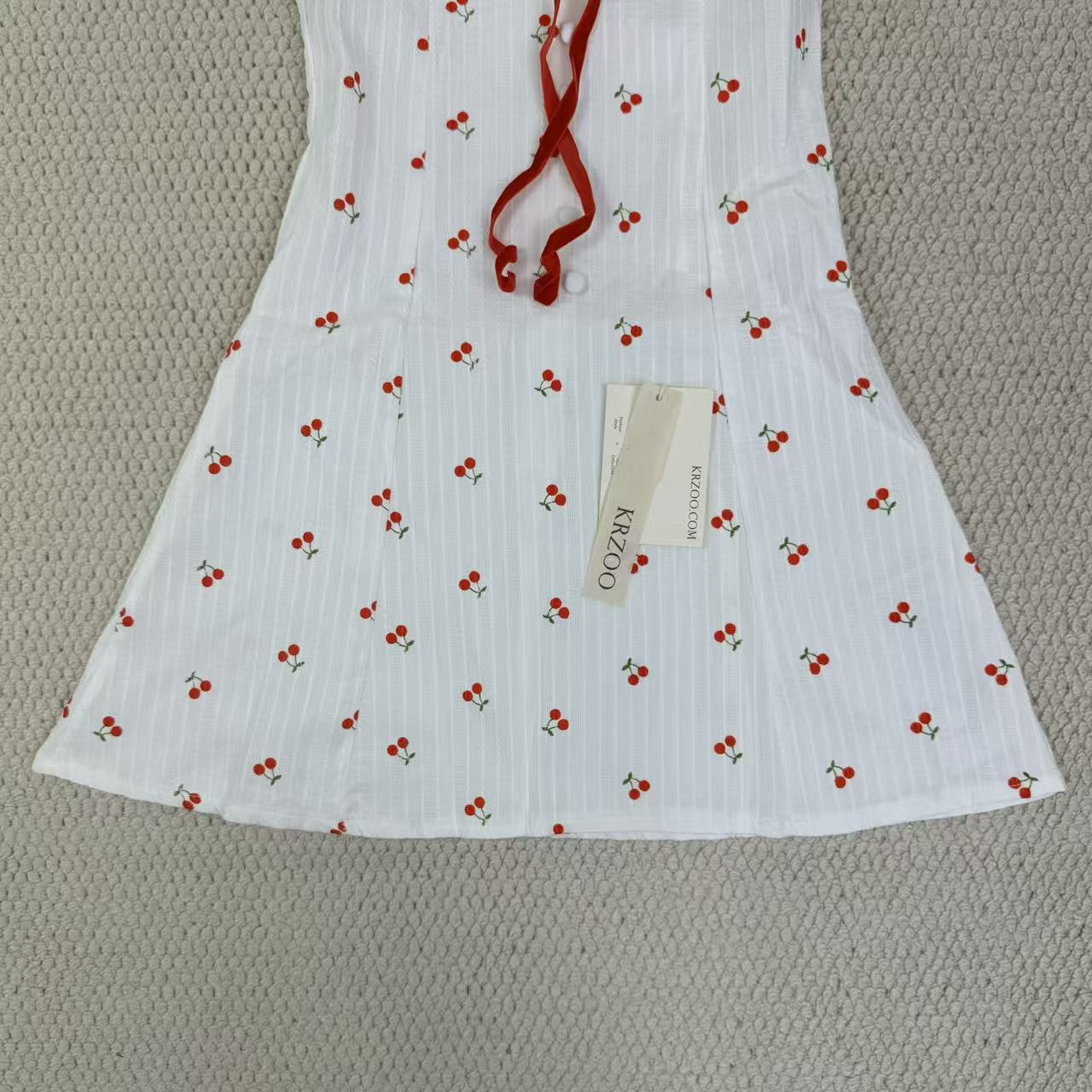 Deep V button-down backless cherry-neckline dress