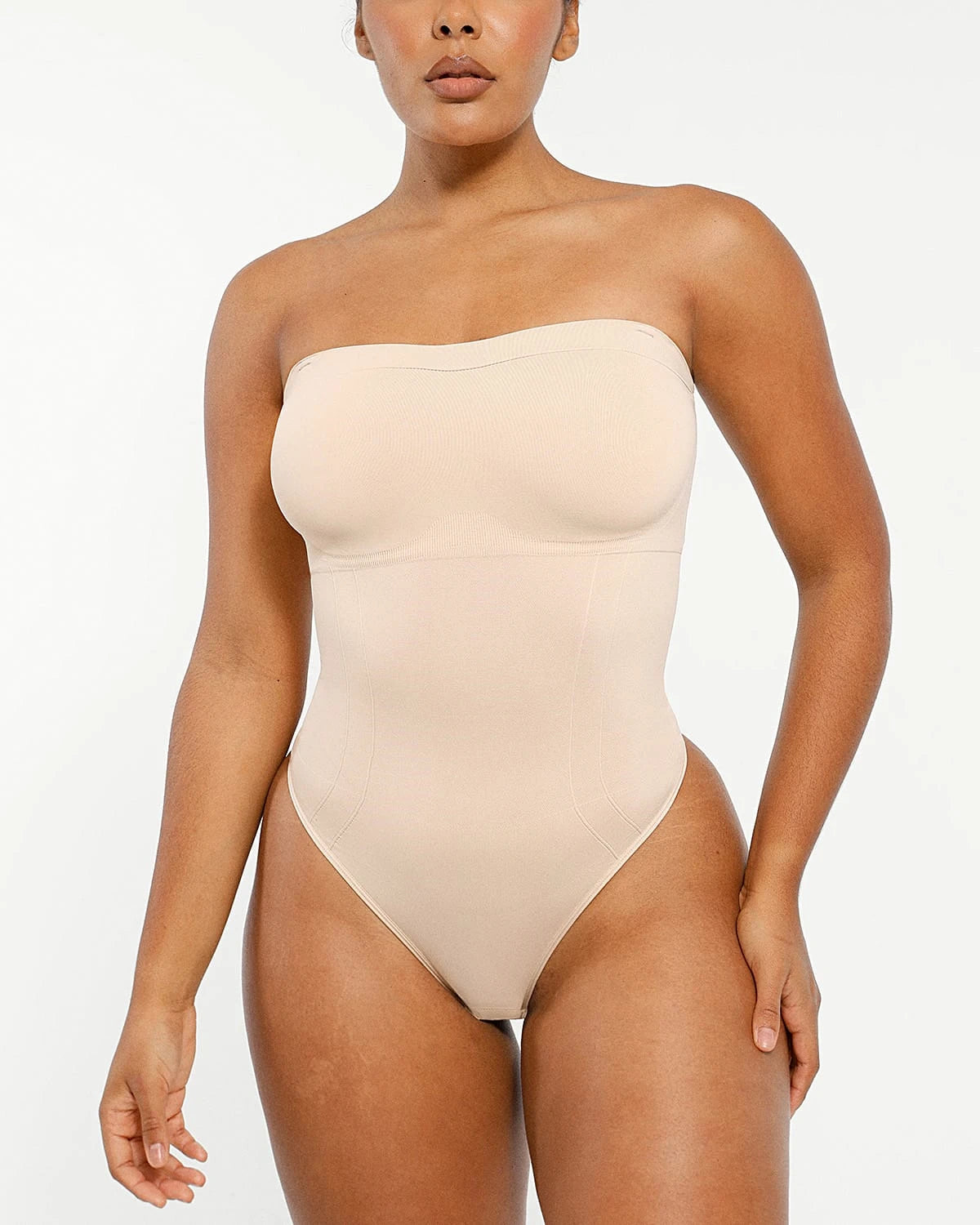 Bare Essentialsâ„?Skin Flow Strapless Sculpt Thong Bodysuit
