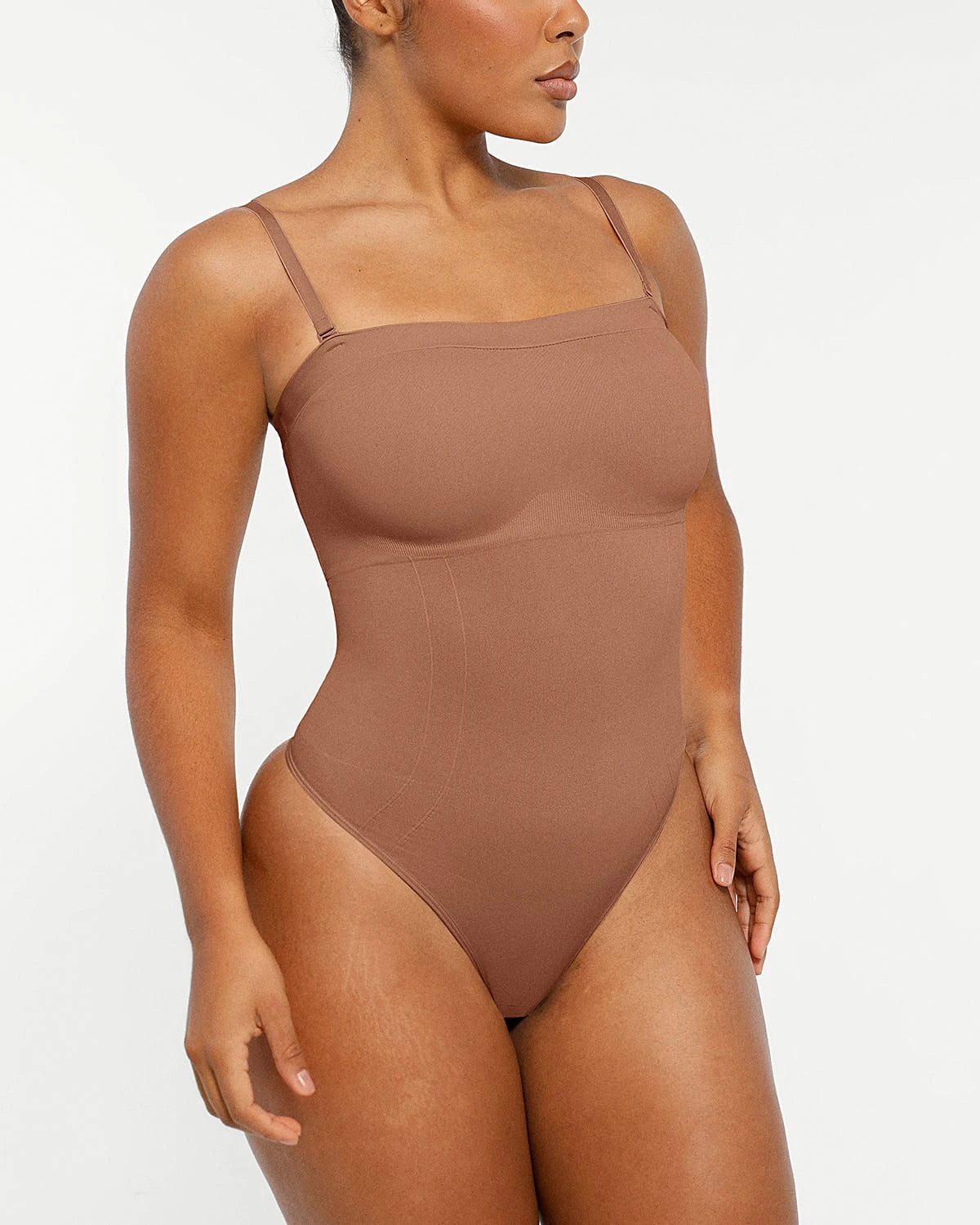 Bare Essentialsâ„?Skin Flow Strapless Sculpt Thong Bodysuit