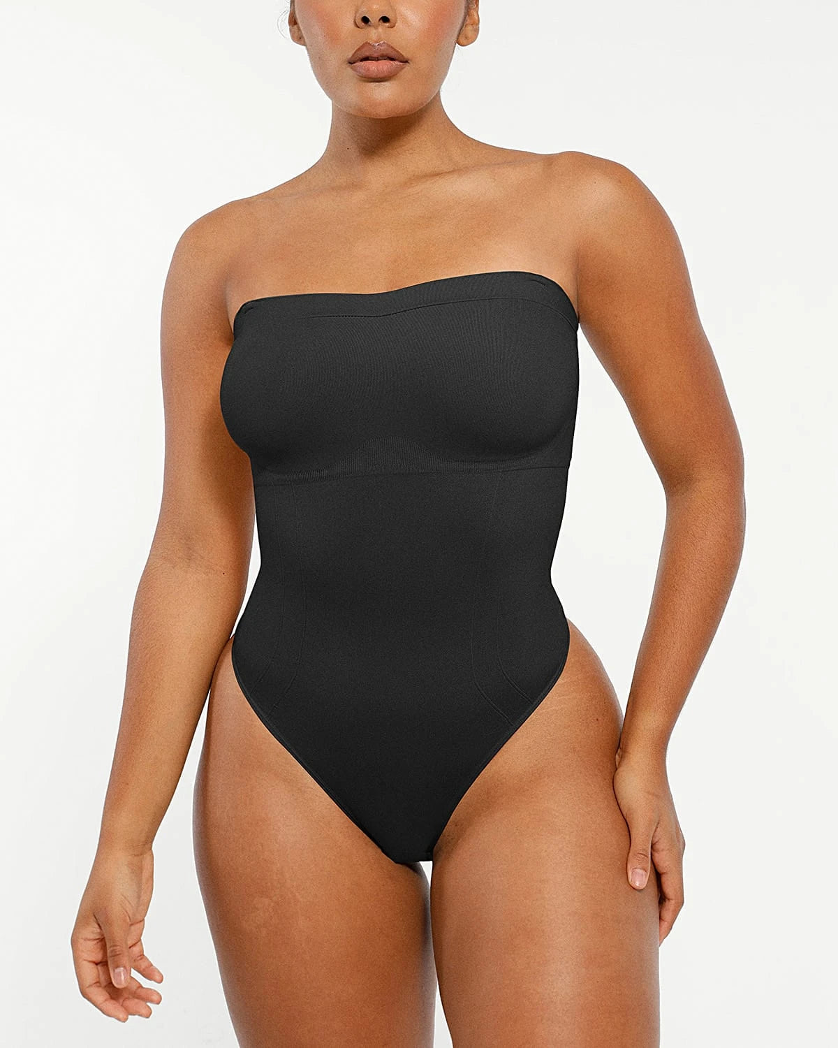 Bare Essentialsâ„?Skin Flow Strapless Sculpt Thong Bodysuit