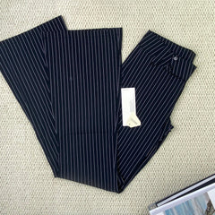 Striped pants are versatile and help slim the figure