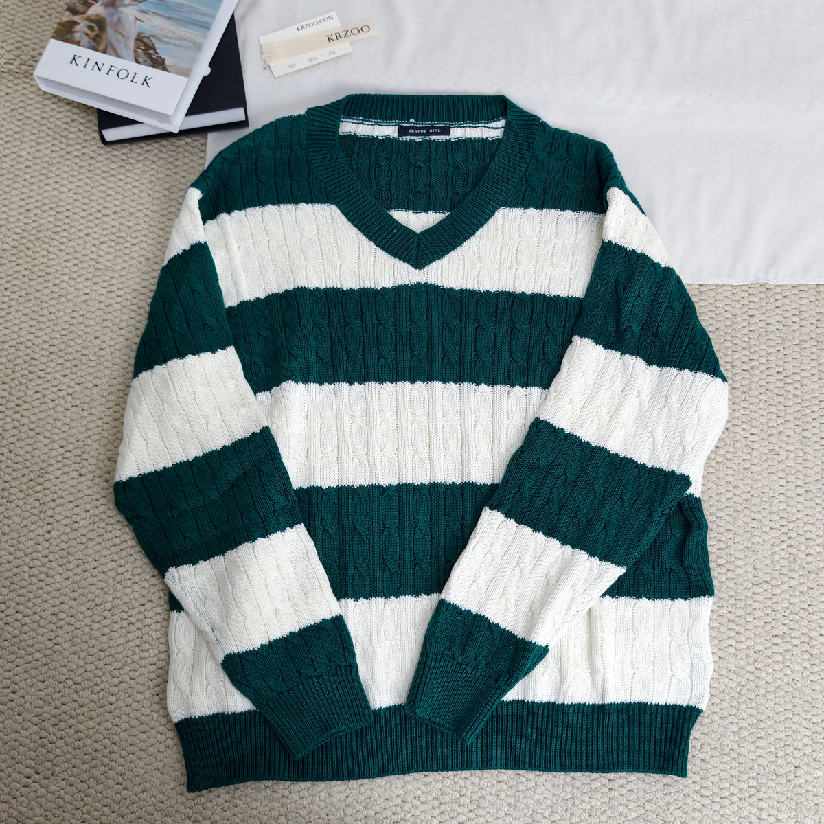 Striped twisted V-neck knitted sweater