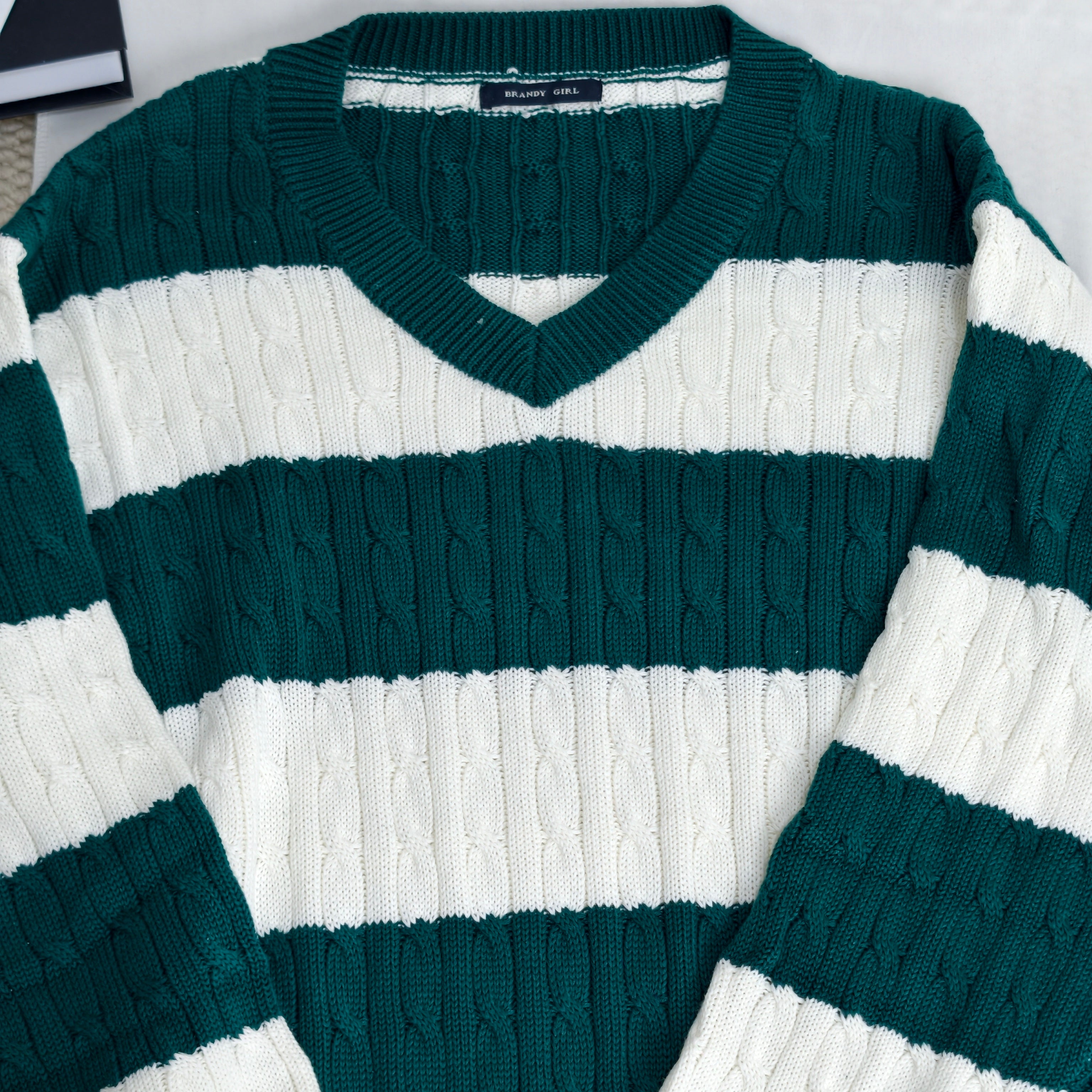 Striped twisted V-neck knitted sweater