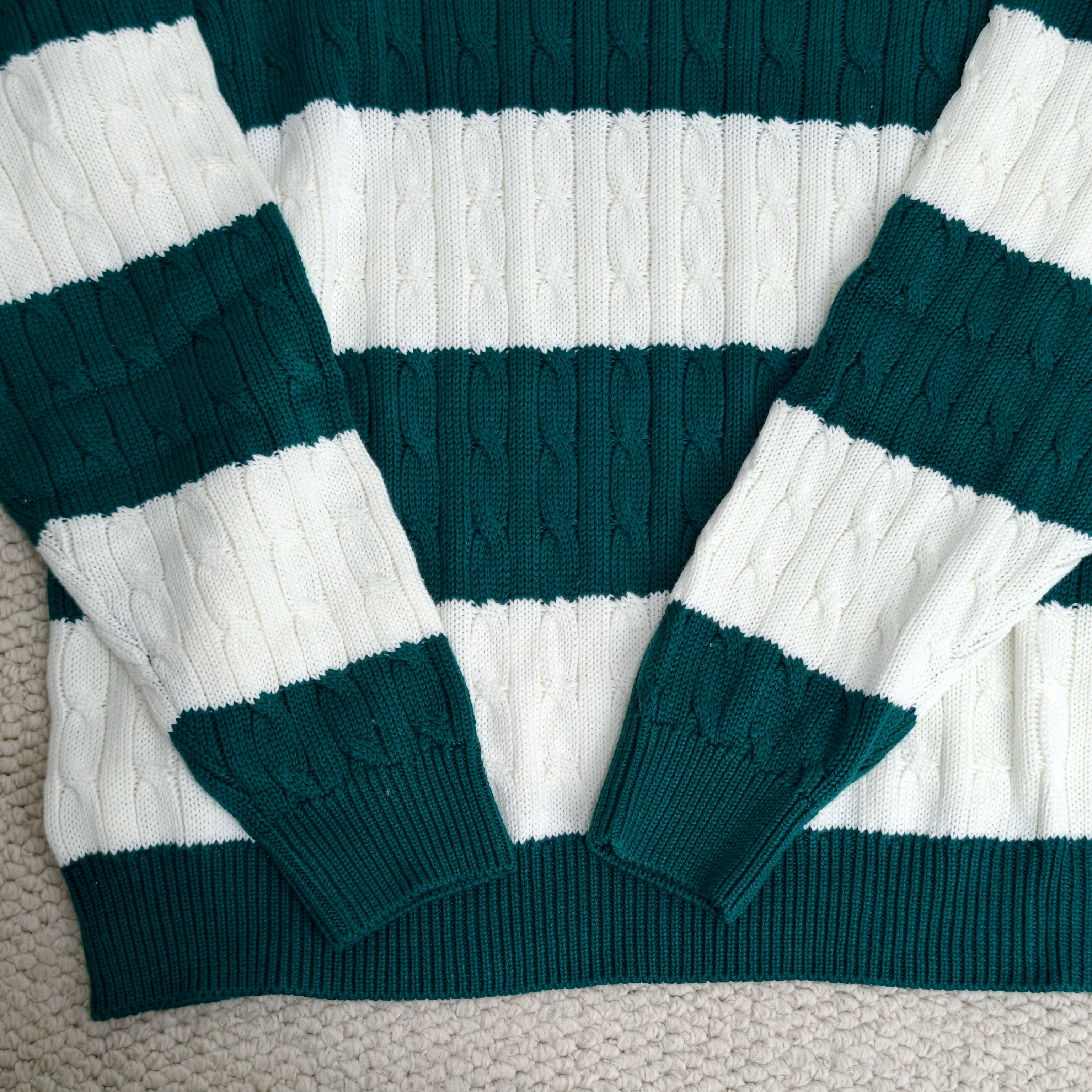 Striped twisted V-neck knitted sweater