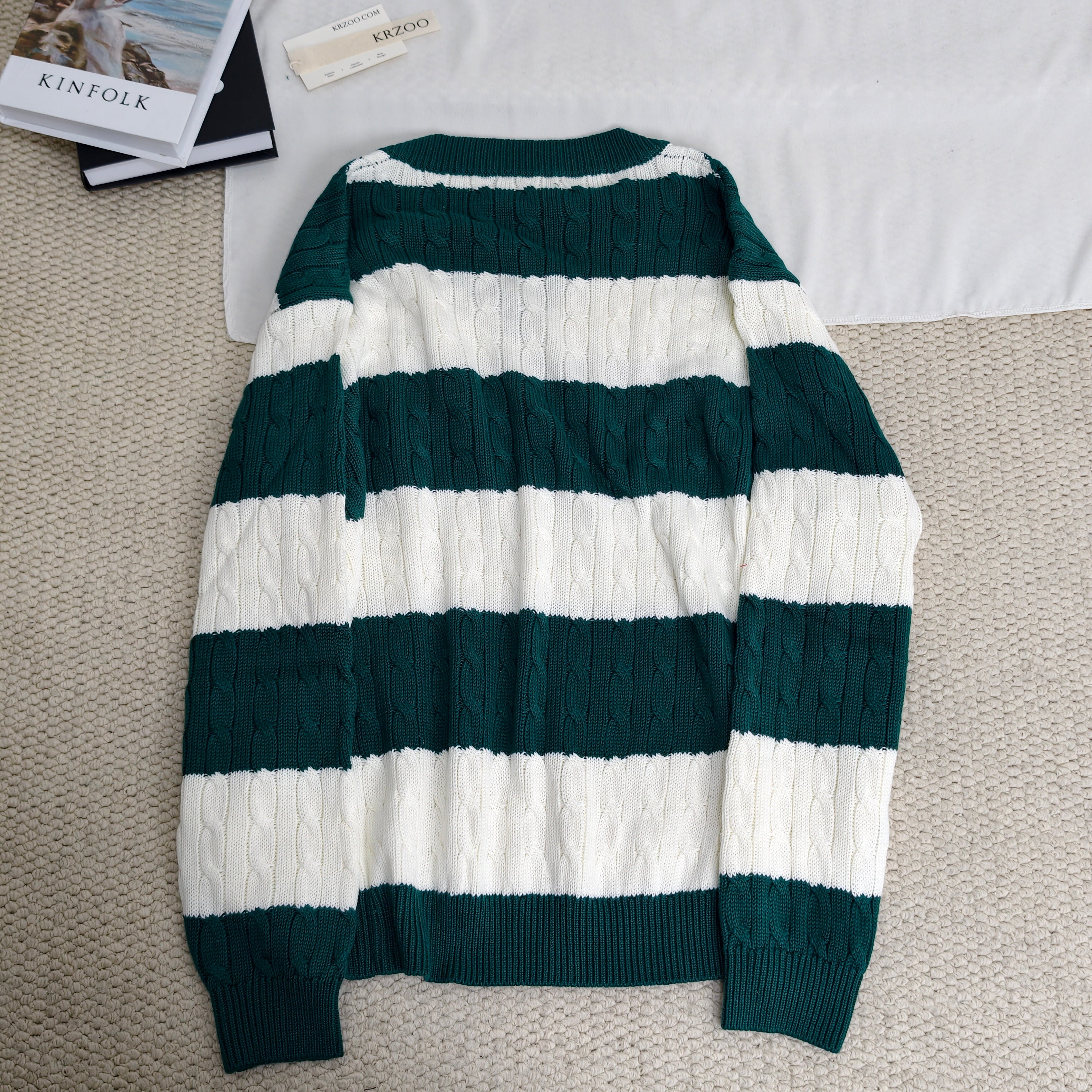 Striped twisted V-neck knitted sweater