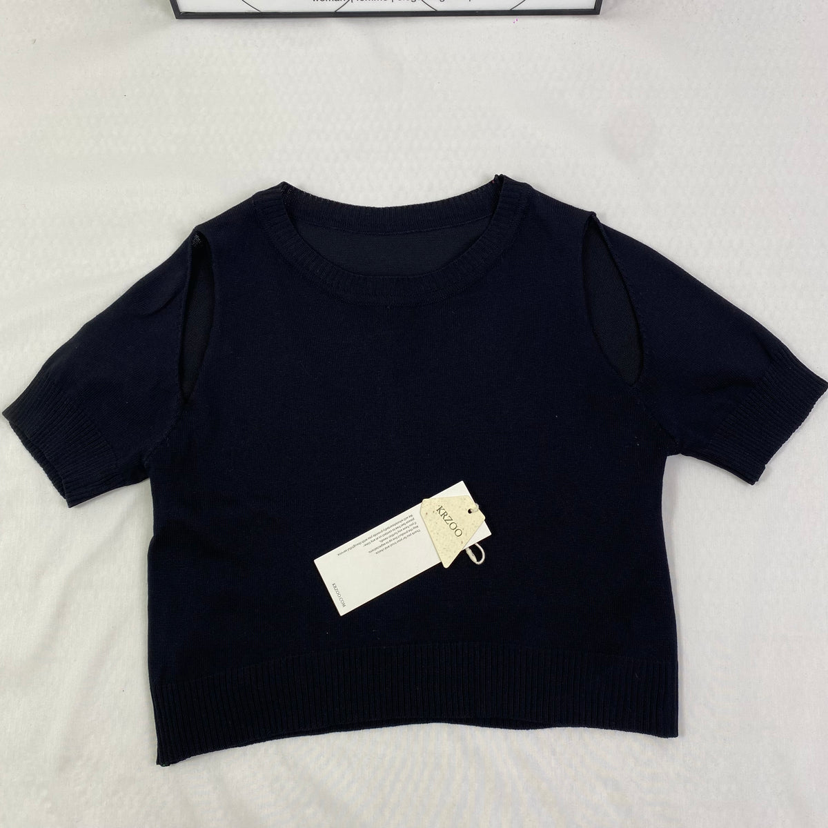 Front shoulder knitted short-sleeved shirt
