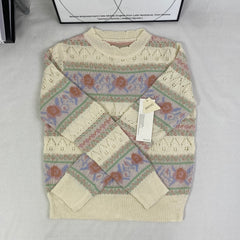 Openwork knitted sweater with patchwork top