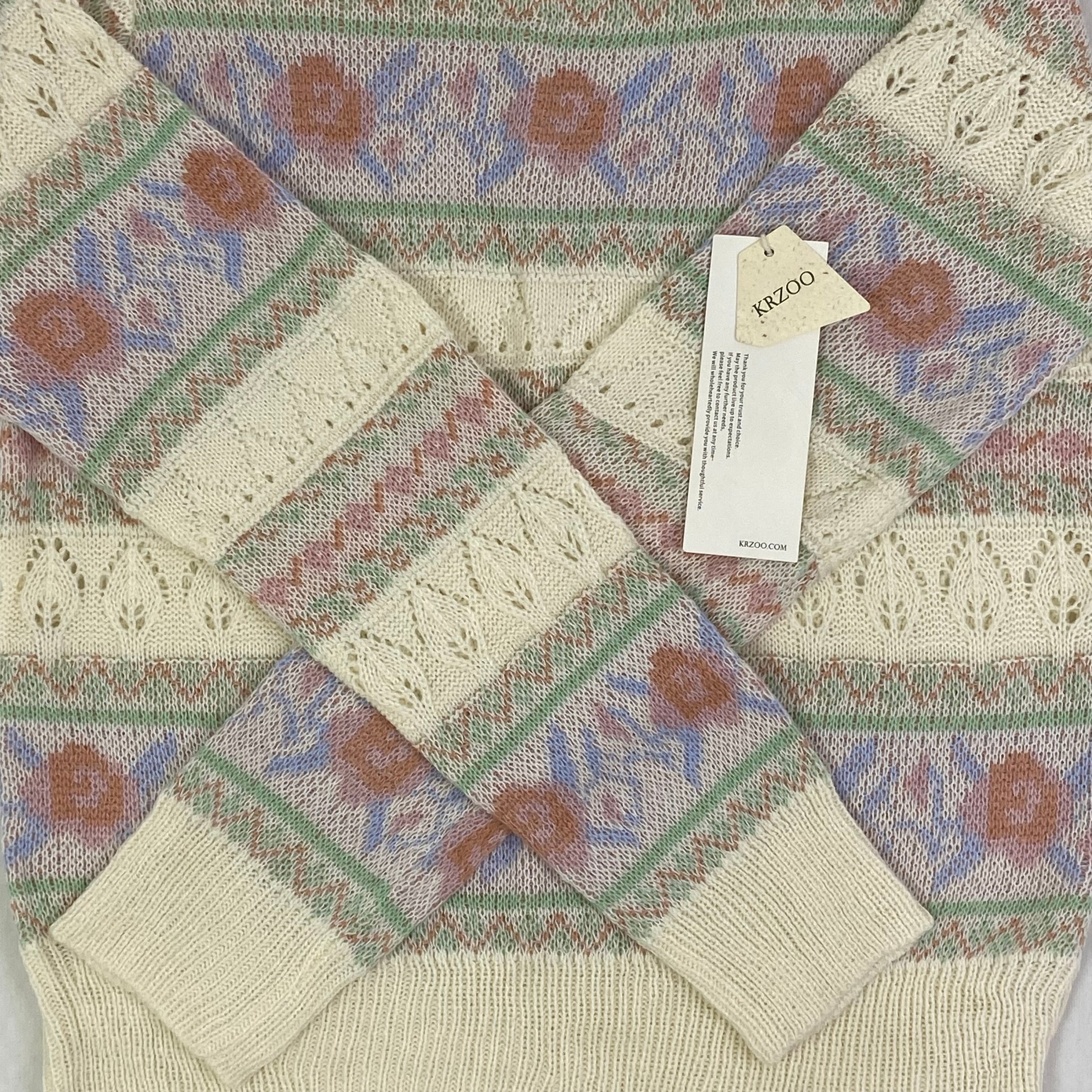 Openwork knitted sweater with patchwork top