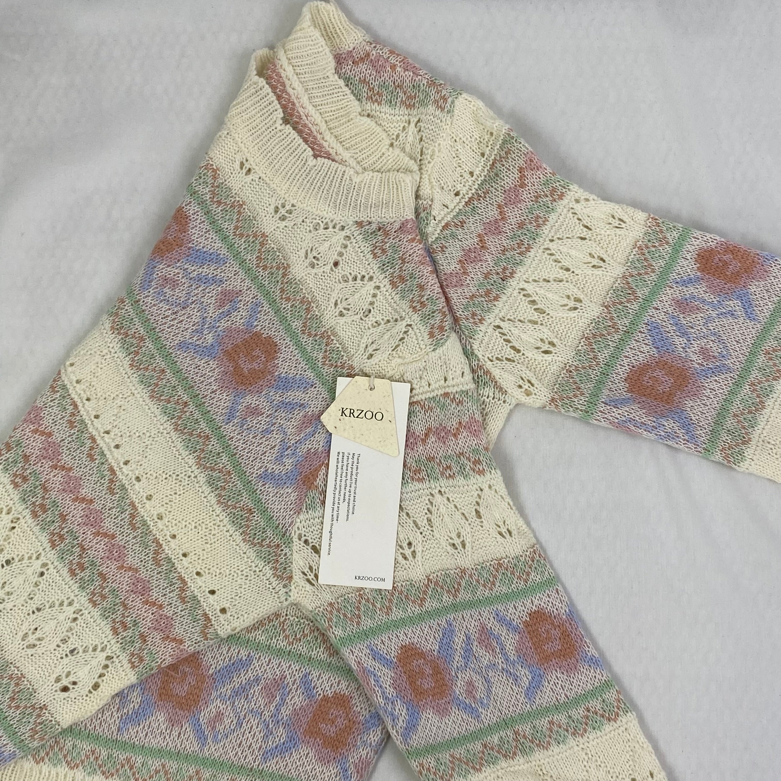 Openwork knitted sweater with patchwork top