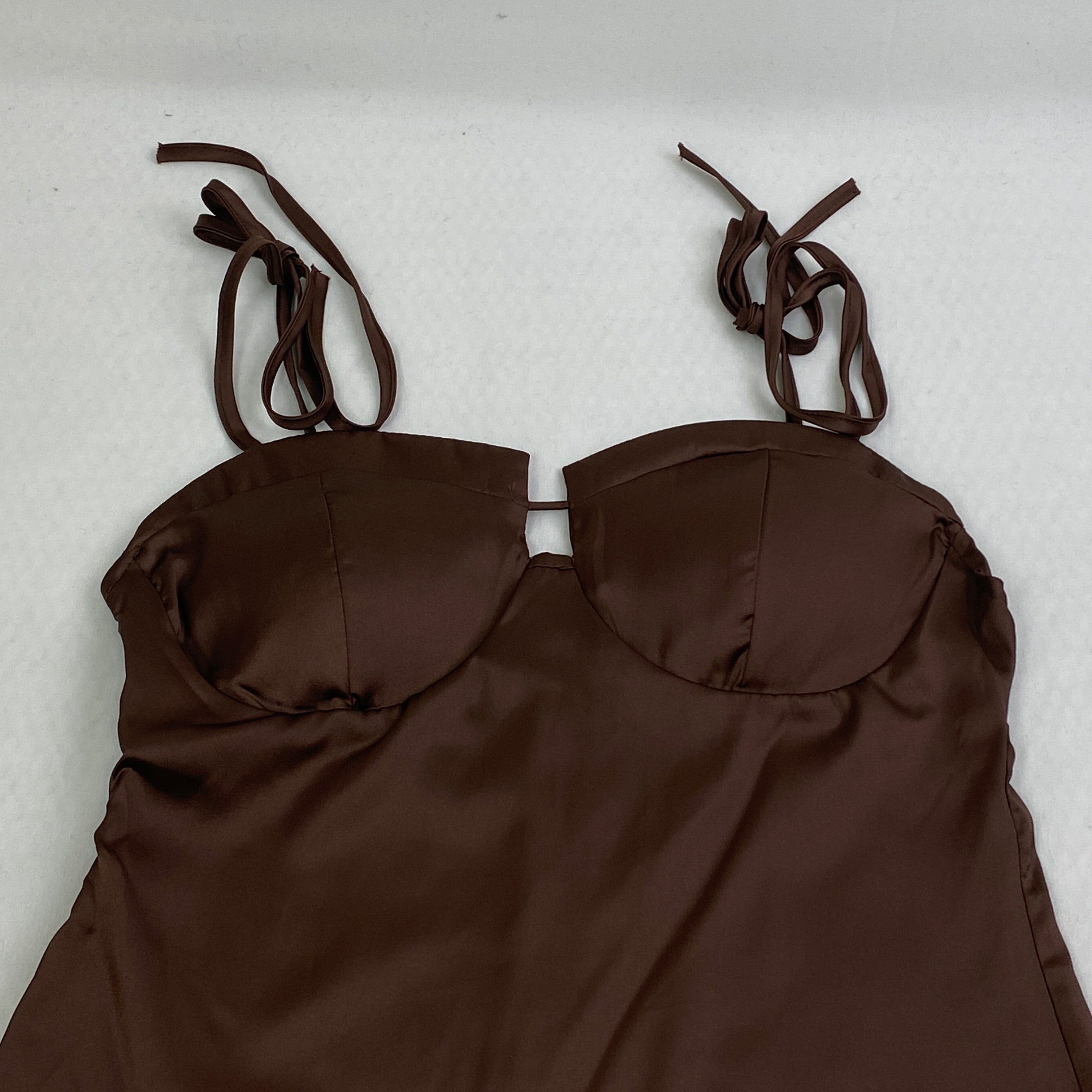 Strapless racerback crop top with a fitted waist design