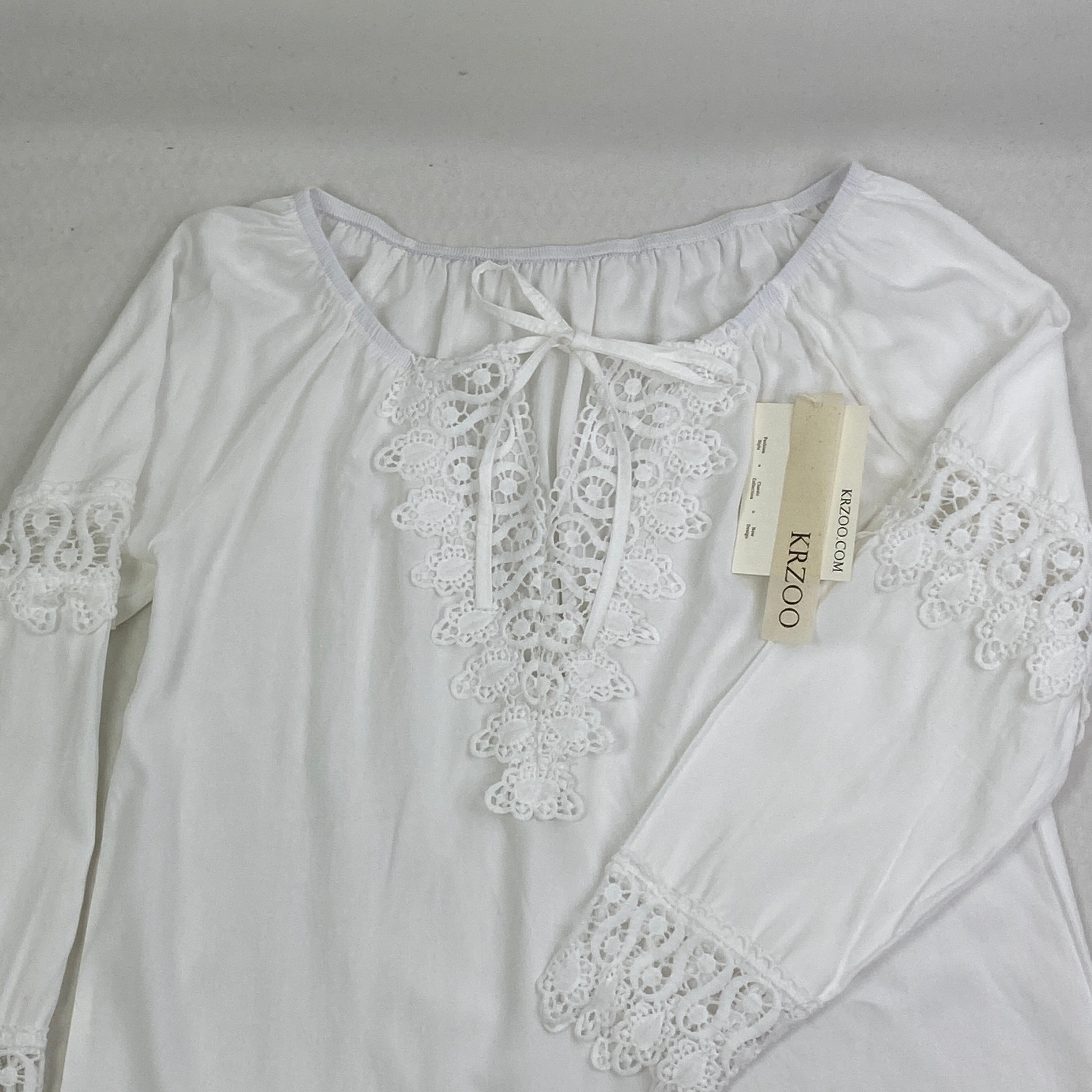 Lace trimmed long-sleeved shirt