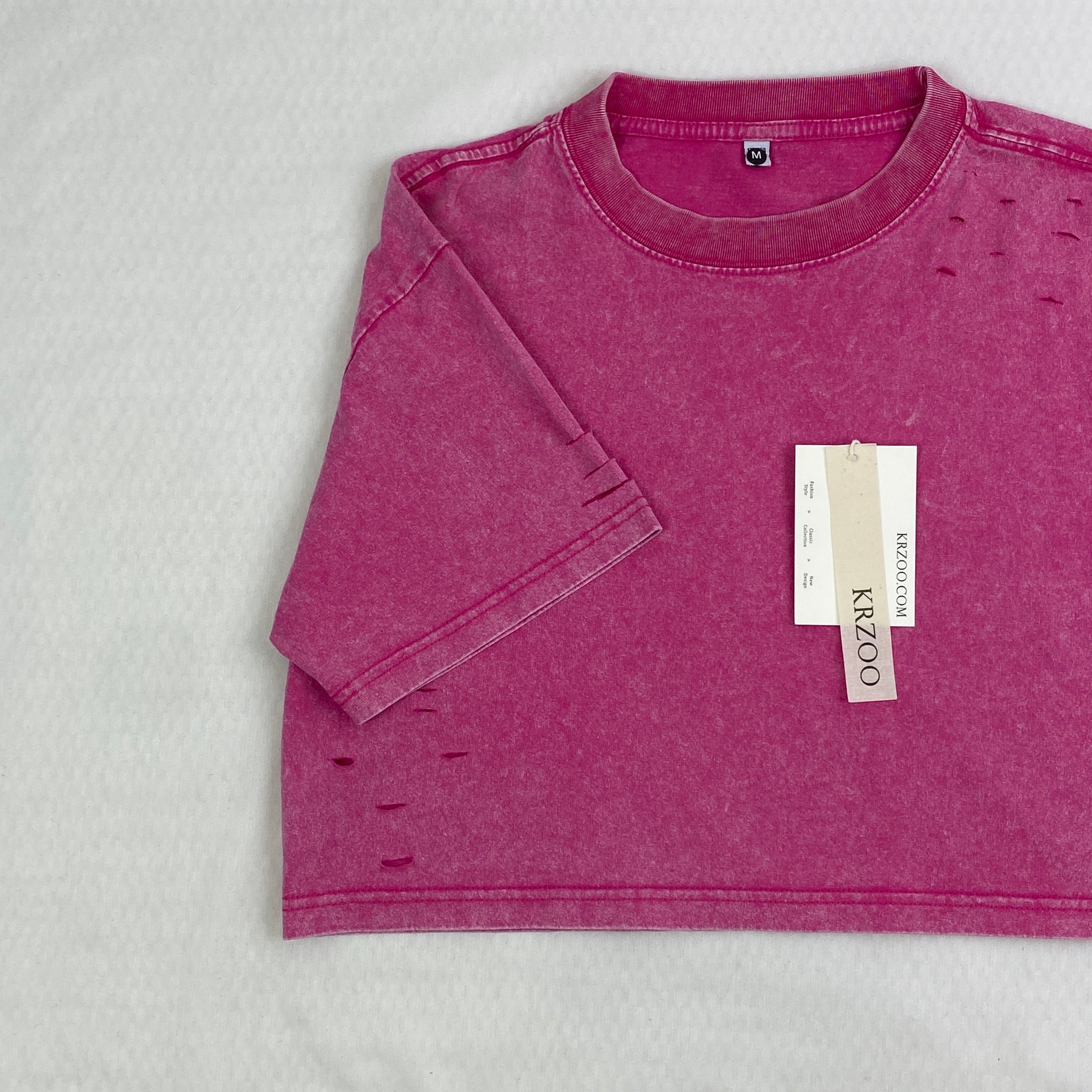 Washed and distressed cotton short-sleeved t-shirt