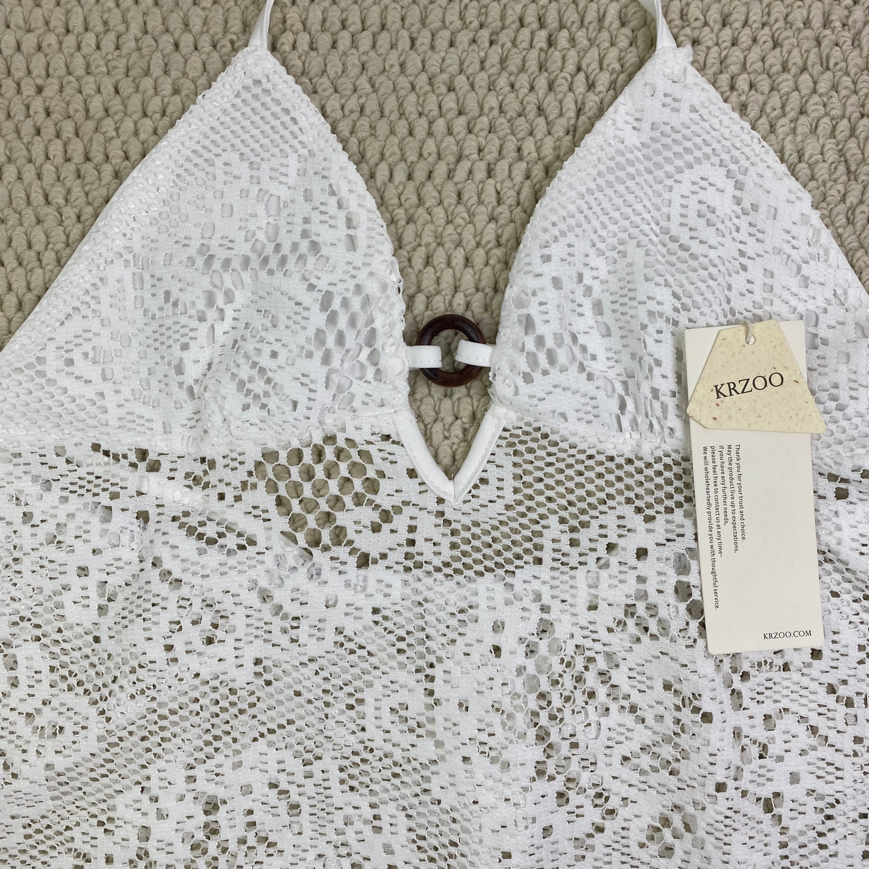 Ruffled lace circular necked top with hollow design