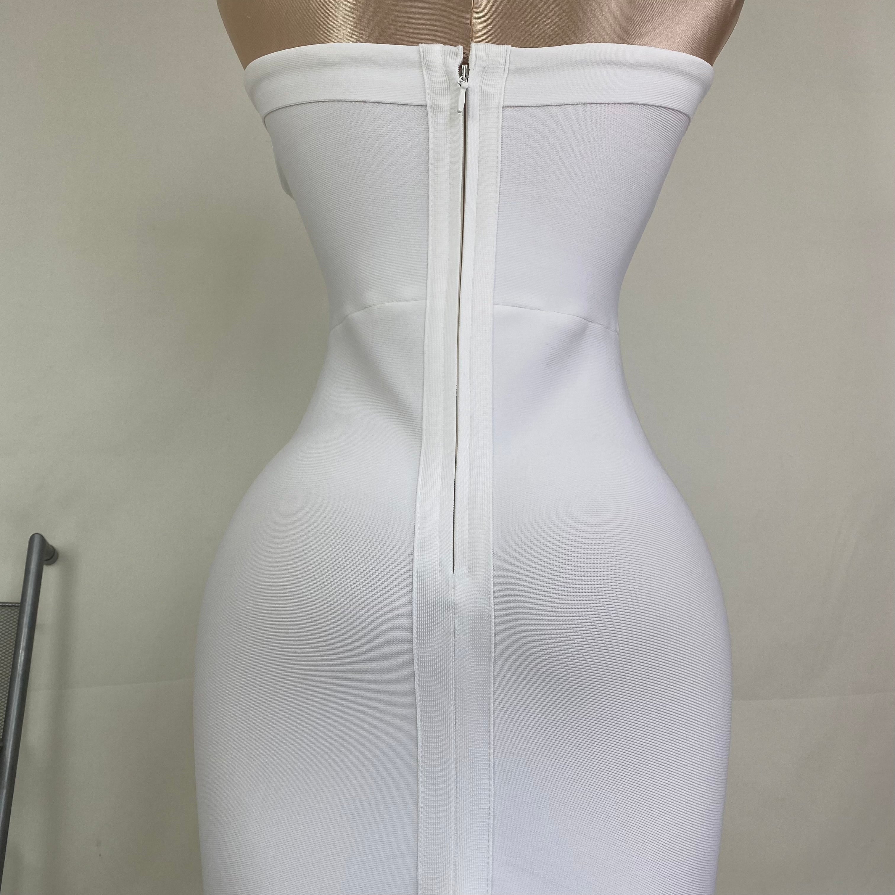 Knitted frilled hemmed plunging dress