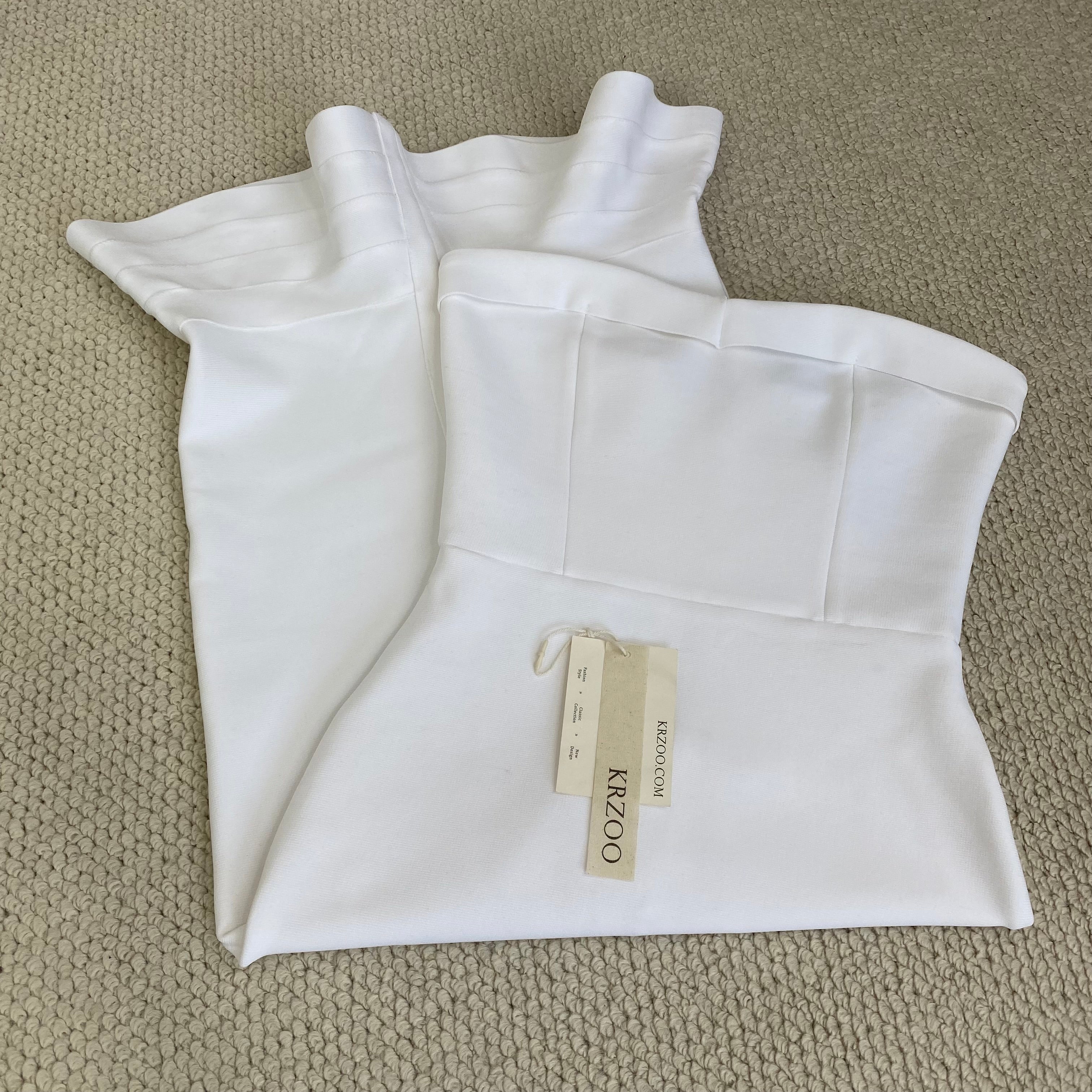 Knitted frilled hemmed plunging dress
