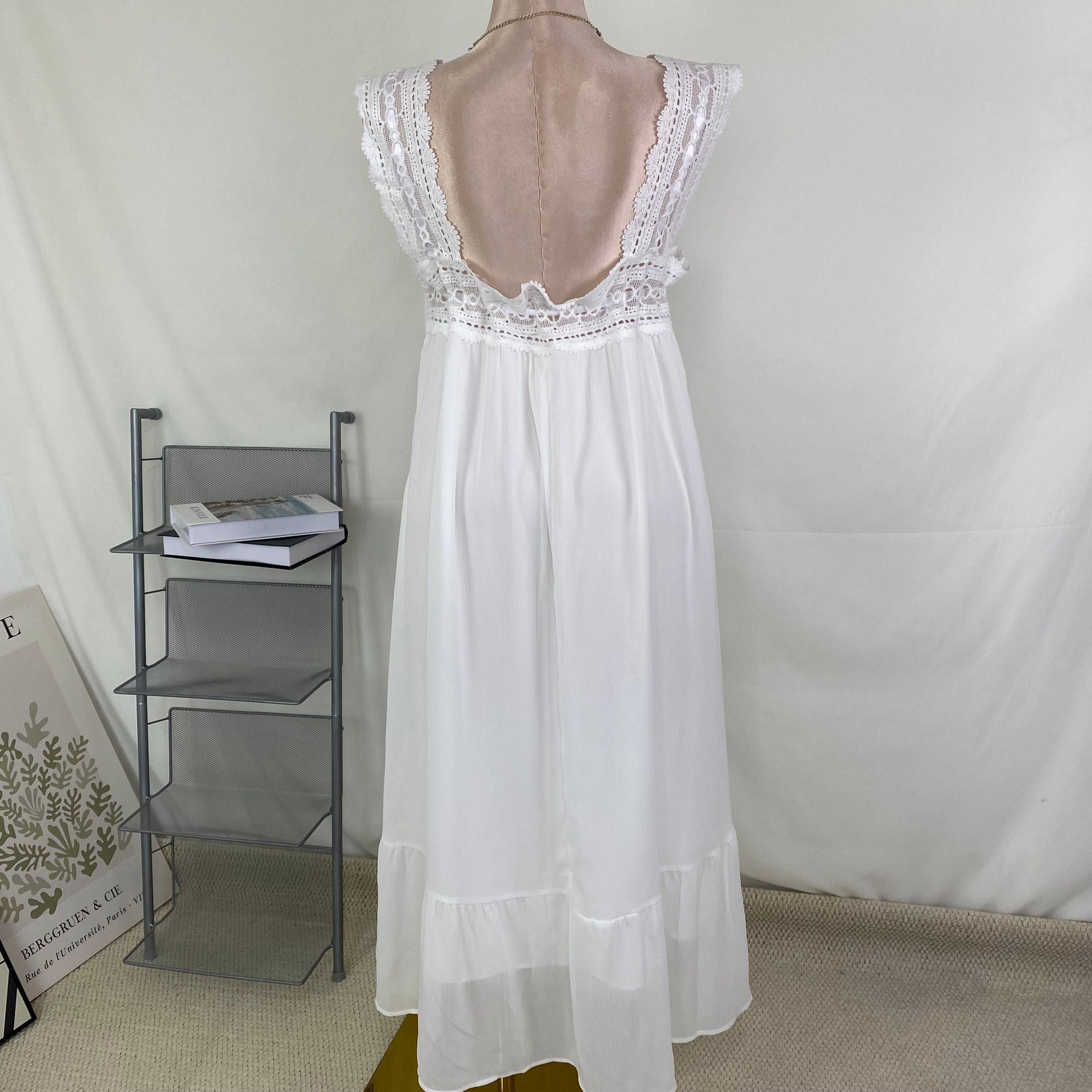 Solid color lace-trimmed sleeveless dress
