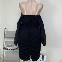 A tight-fitting short dress with a plunging neckline