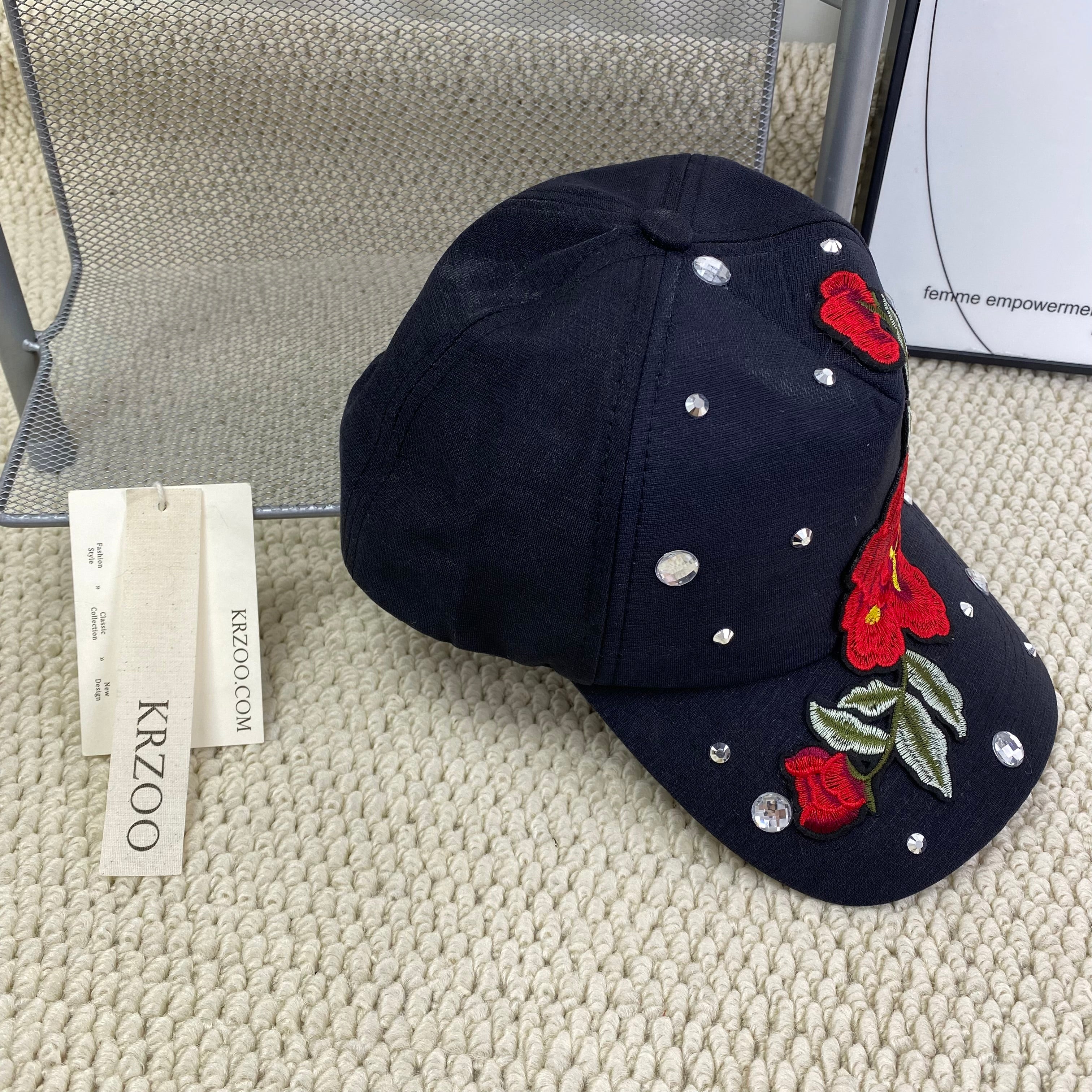 Rose-colored hat with diamond trim baseball cap