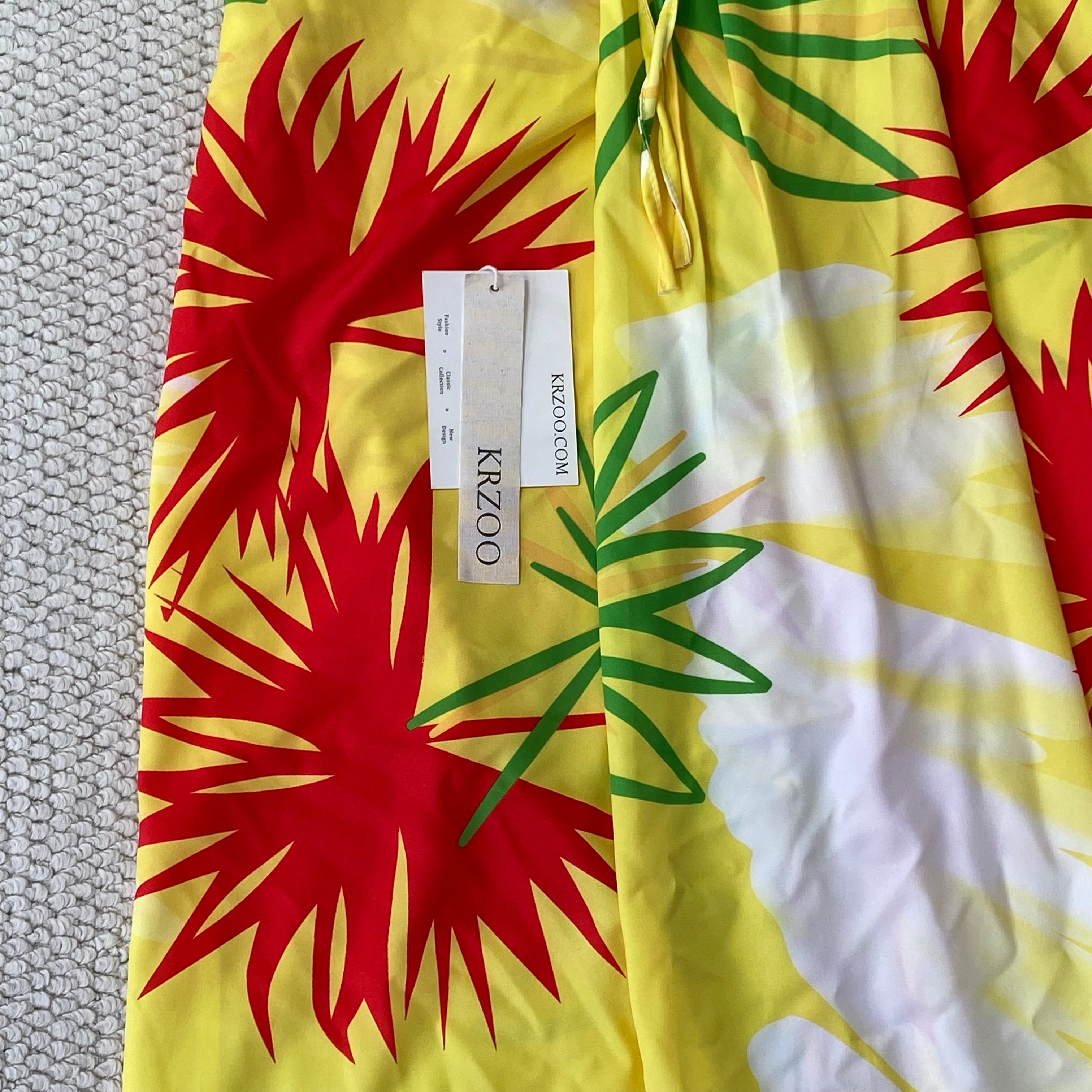 A strapless floral-printed halter dress