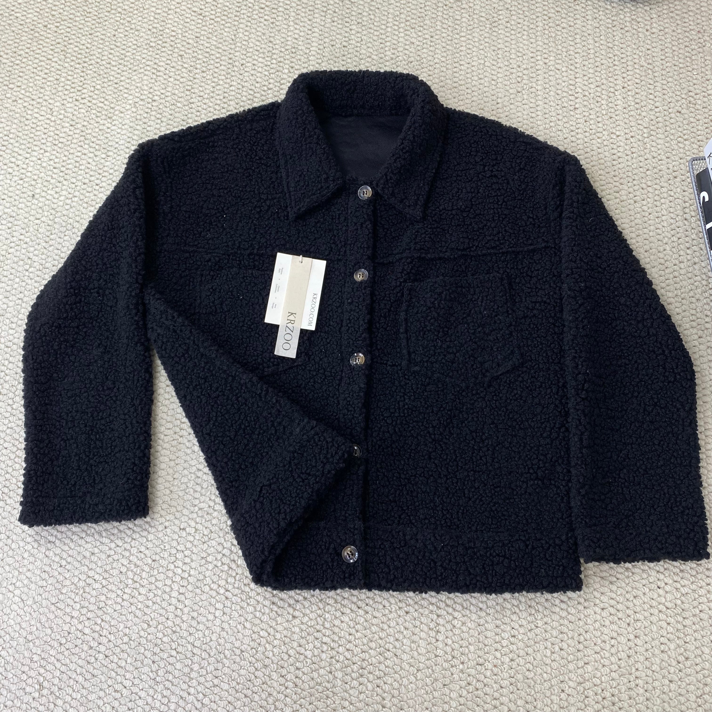 Collared single-breasted sheepskin coat