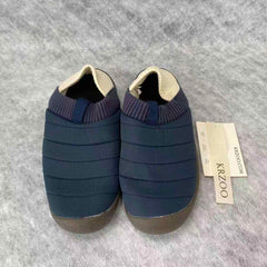 Wearing two pairs of short woolen shoes