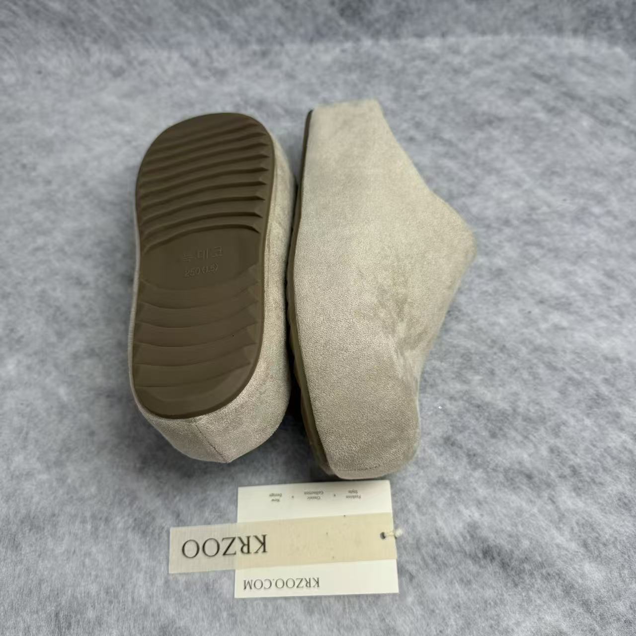 One foot wearing a thick-soled baghdad-style shoe