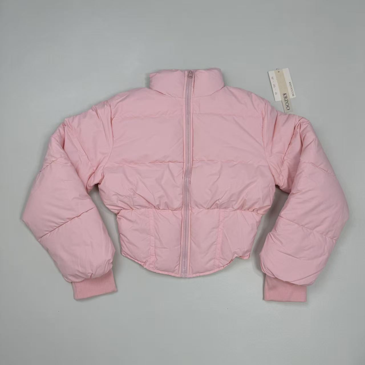 A slim-fitting short coat with a stand-up collar