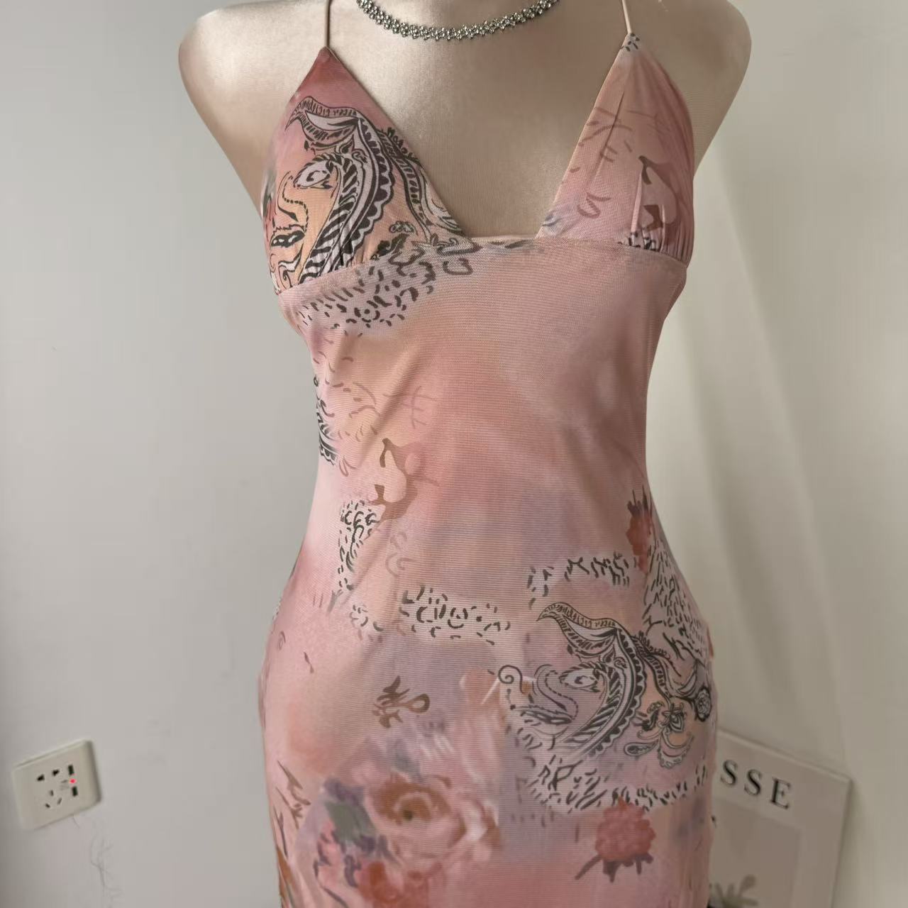 Neck-length fitted printed A-line dress