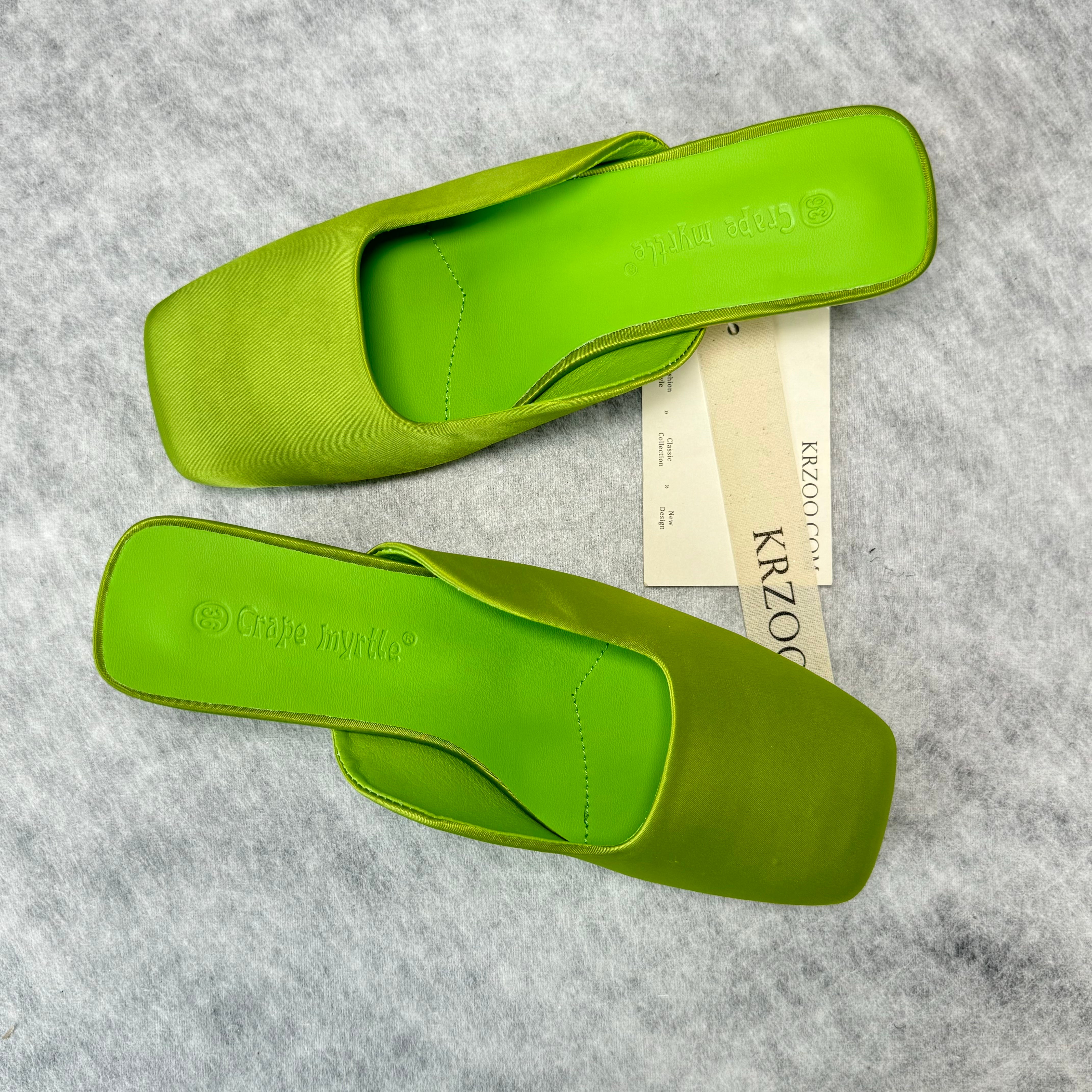 Round-headed satin-covered triangular heel